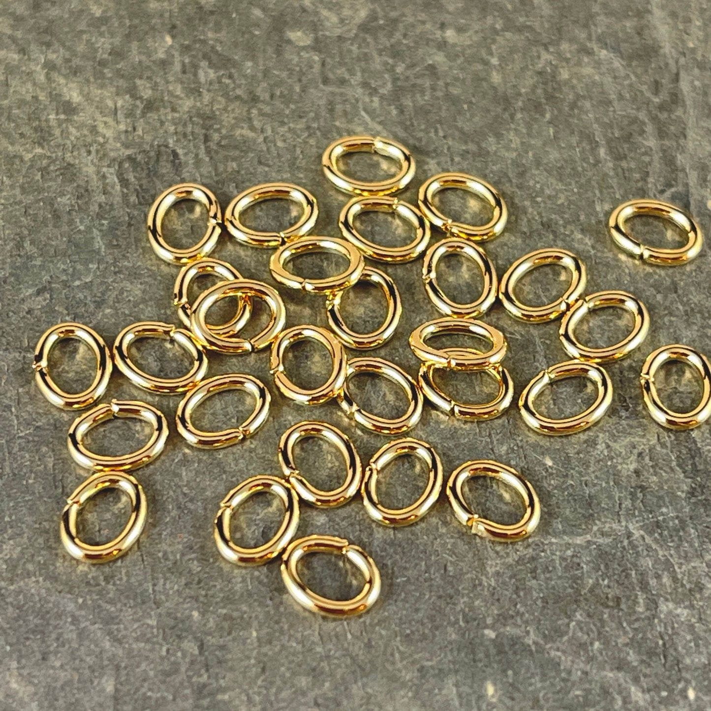 6x4mm Oval Jump Rings, 18g Open, Gold Plated Brass (FMG/5048) * Qty. 100