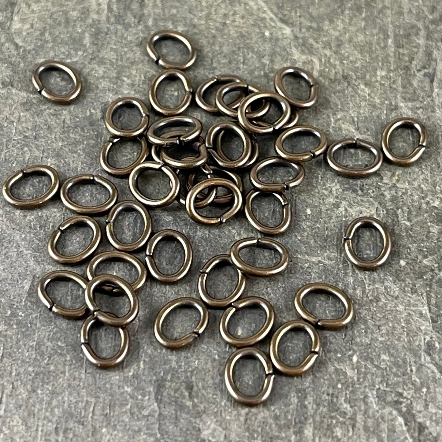6x4mm Oval Jump Rings, 18g Open, Antiqued Brass Plated (FMG/5054) * Qty. 100