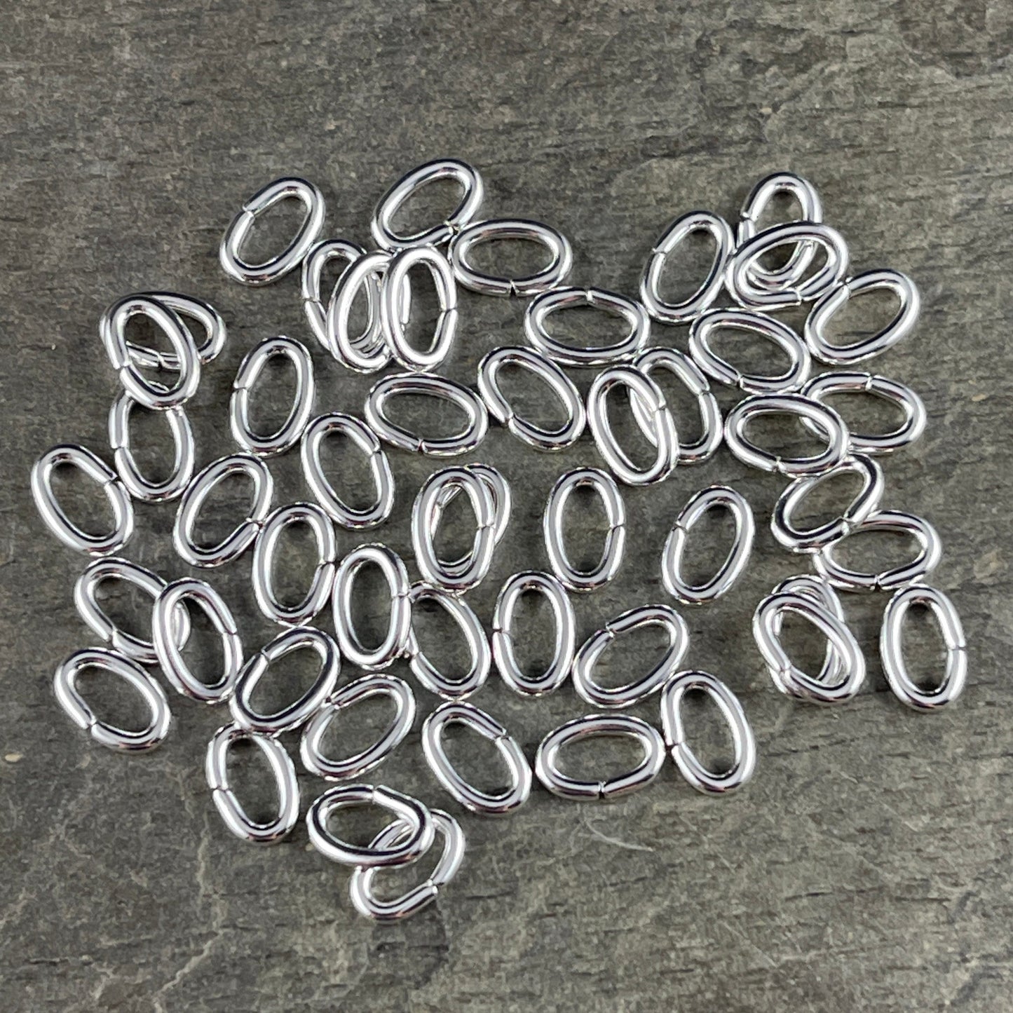 6x4mm Oval Jump Rings, 18g Open, Silver Plated Brass (FMG/9910) * Qty. 100