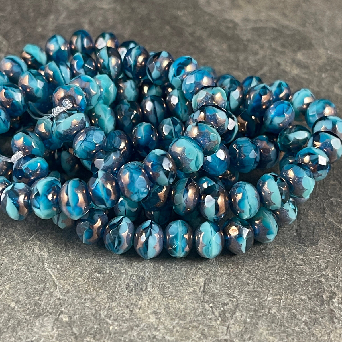 Czech Glass Beads - 7x5mm Rondelle, Two-tone Transparent Capri and Turquoise Blue with Bronze Picasso (R7/N-0290) * Qty. 25
