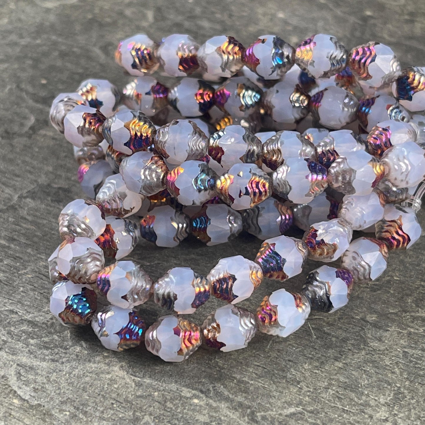 Czech Glass Beads - Cathedral 8x6mm Carved Oval Bicone, Milky White with Rainbow Metallic Finish (CTD/N-054) * Qty. 15