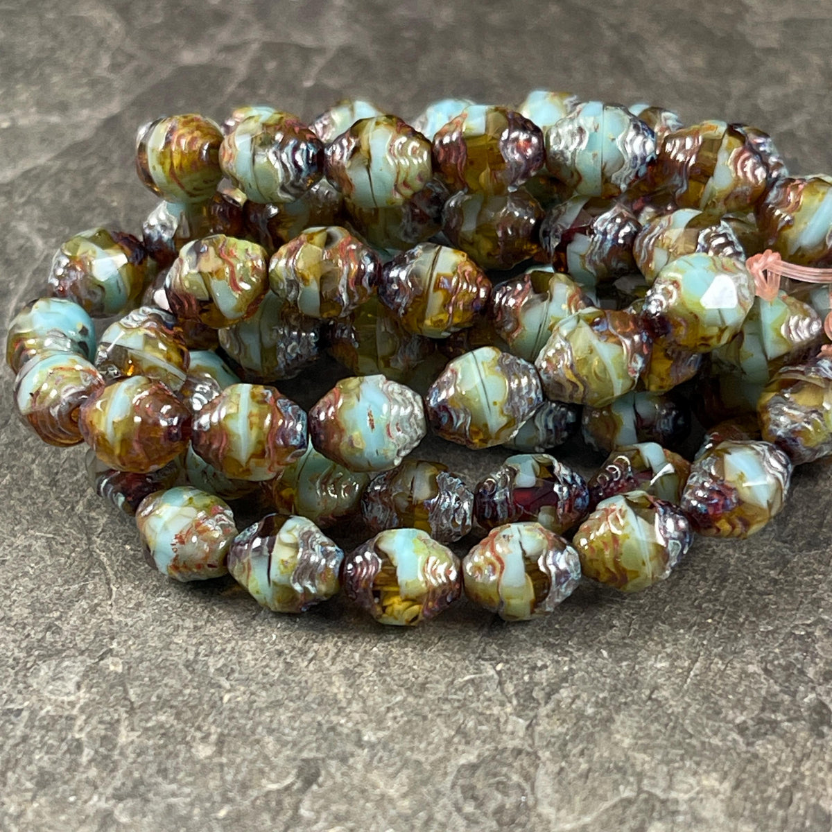 Czech Glass Beads - Sky Blue and Brown Picasso Cathedral 8x6mm Carved Oval Bicone (CTD/N-048) * Qty. 15