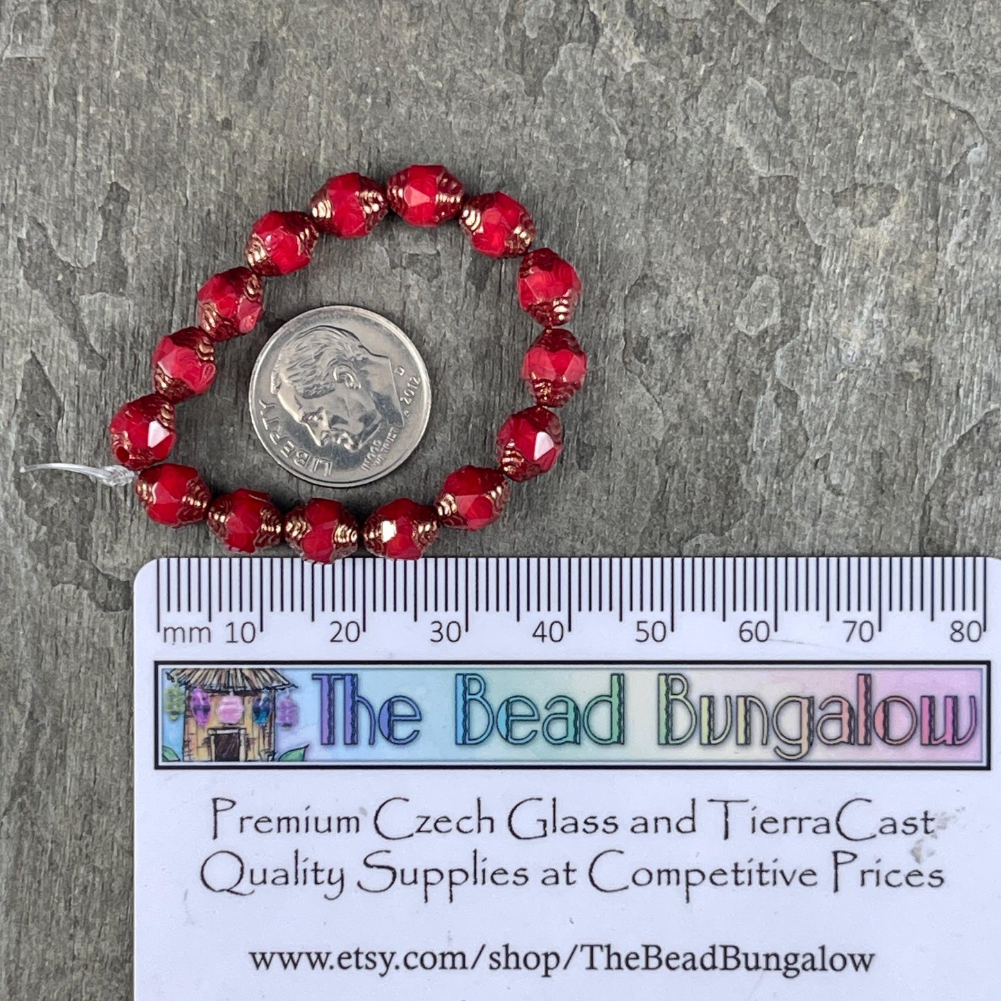 Czech Glass Beads, Red Cathedral 8x6mm Carved Oval Bicone (CTD/N-007) * Qty. 15