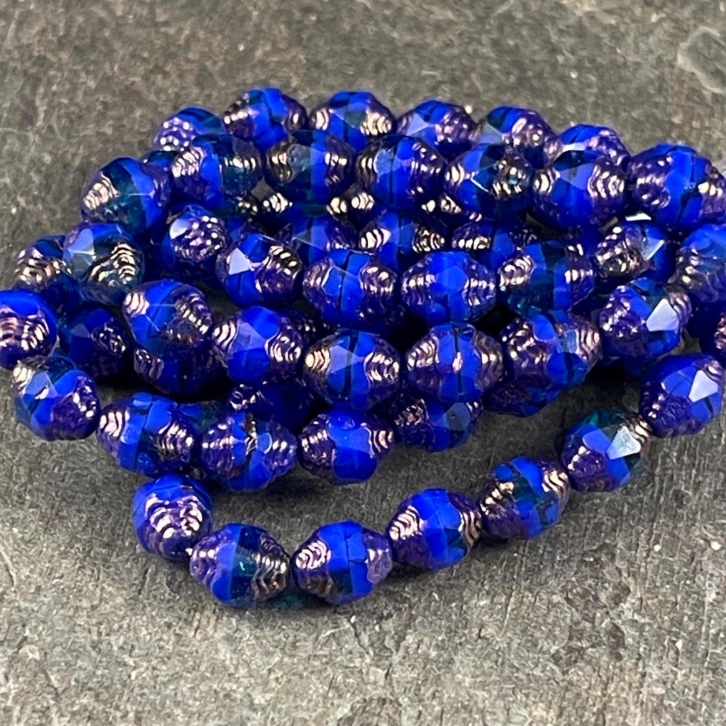 Czech Glass Beads, Royal Blue Cathedral 8x6mm Carved Oval Bicone (CTD/N-051) * Qty. 15