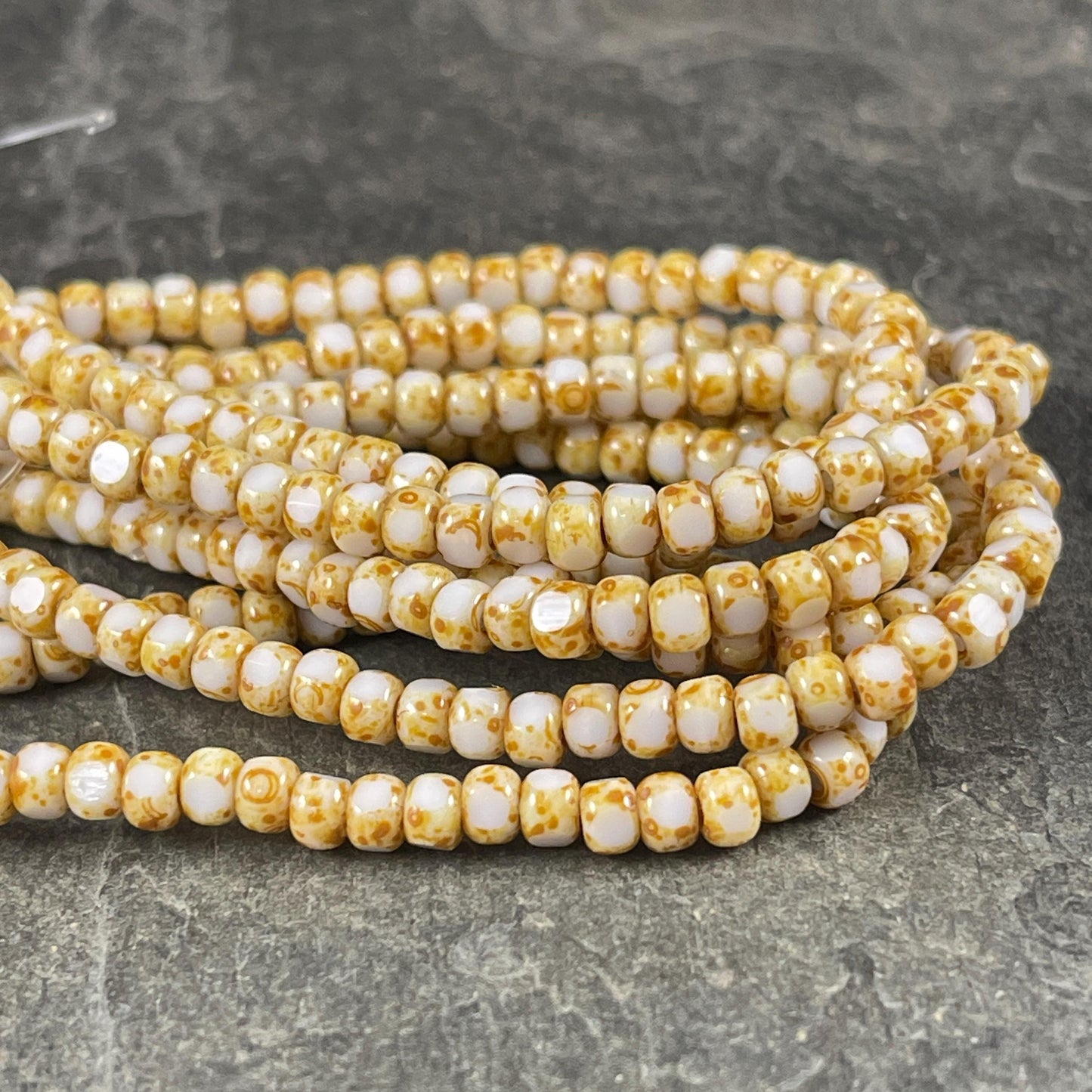 Czech Glass Beads - 4x3mm Tri-cut 6/0 Seed Bead, Ivory with Picasso (TRICA/N-1200) * Qty. 50