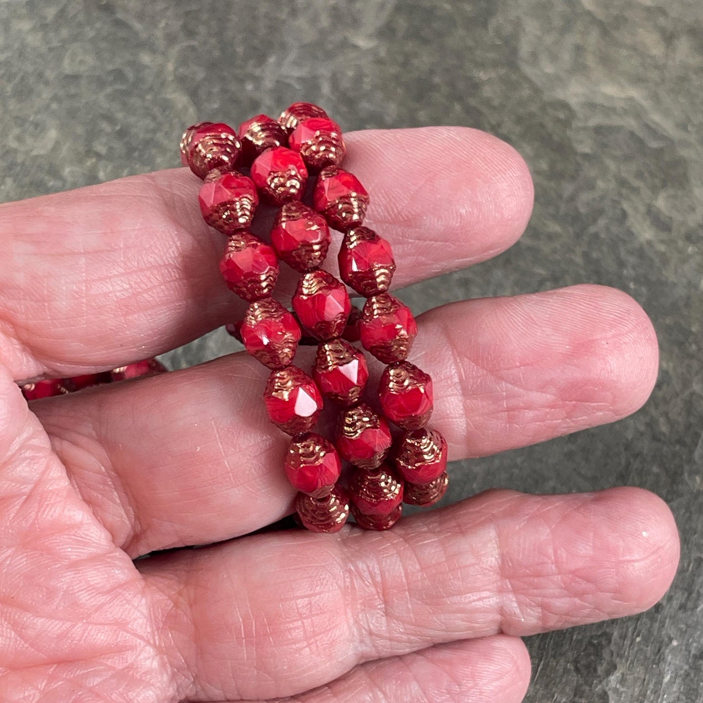 Czech Glass Beads, Red Cathedral 8x6mm Carved Oval Bicone (CTD/N-007) * Qty. 15