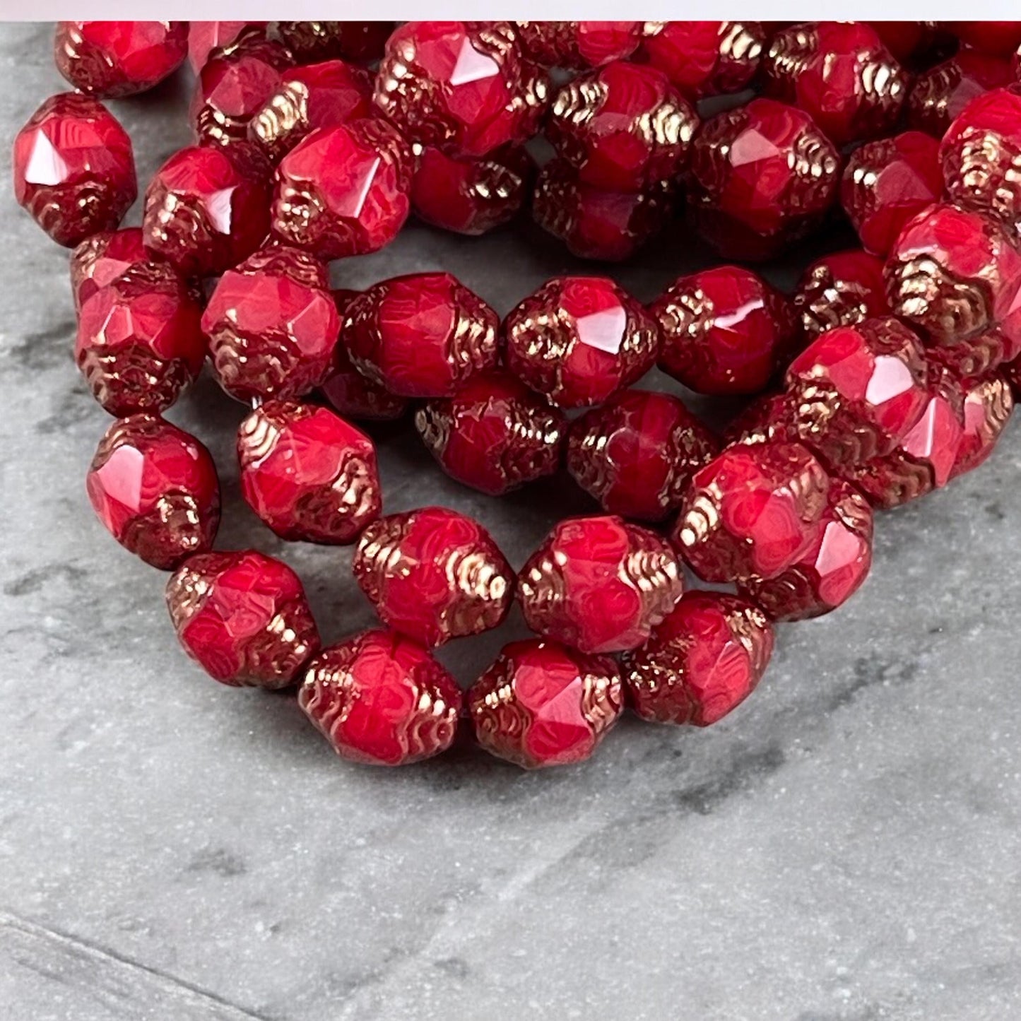 Czech Glass Beads, Red Cathedral 8x6mm Carved Oval Bicone (CTD/N-007) * Qty. 15