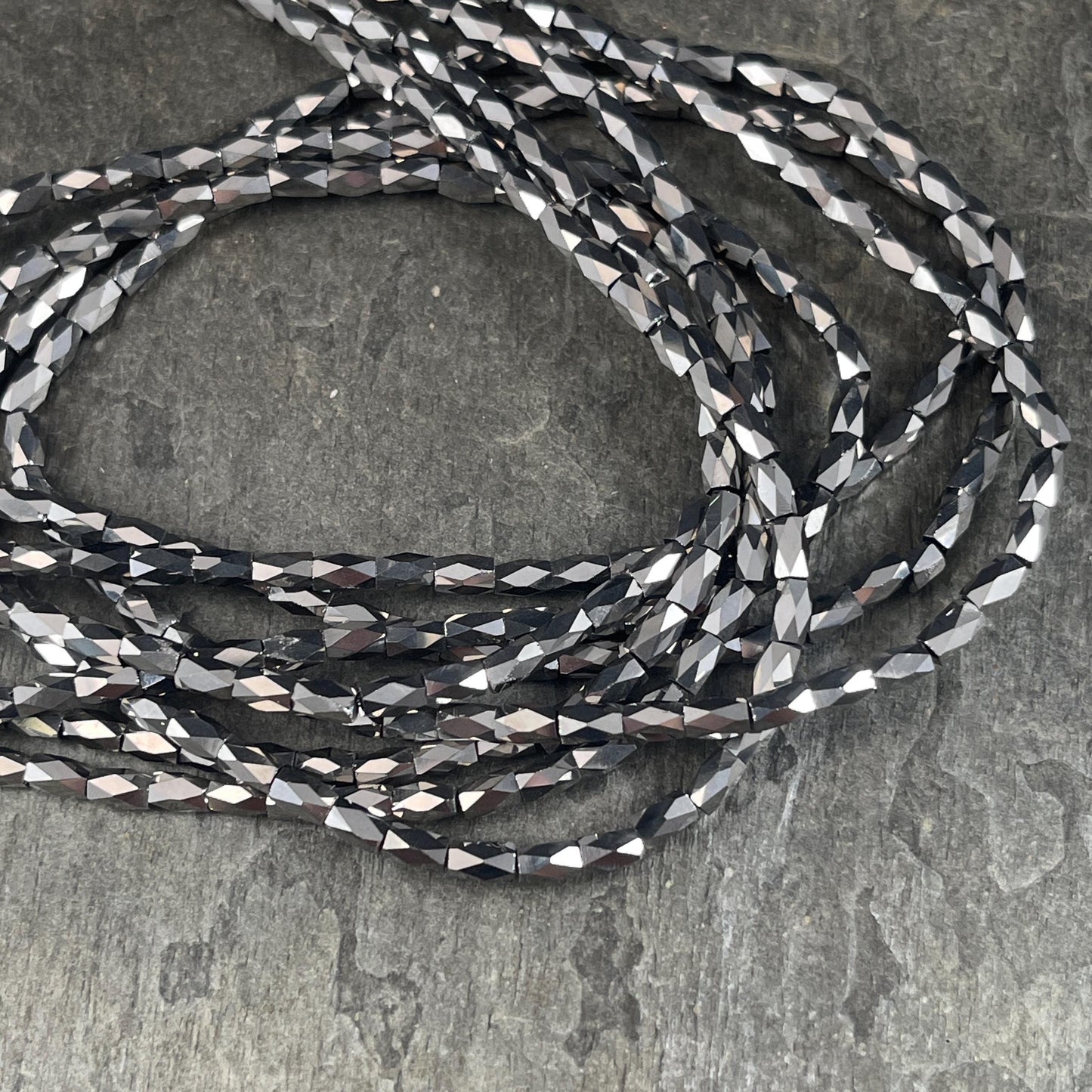 Skinny Faceted Tube Beads, 5x3mm Hematite Gray Beads, Dark Grey Faceted Glass Beads (FGT-Hematite) * 18" Strand