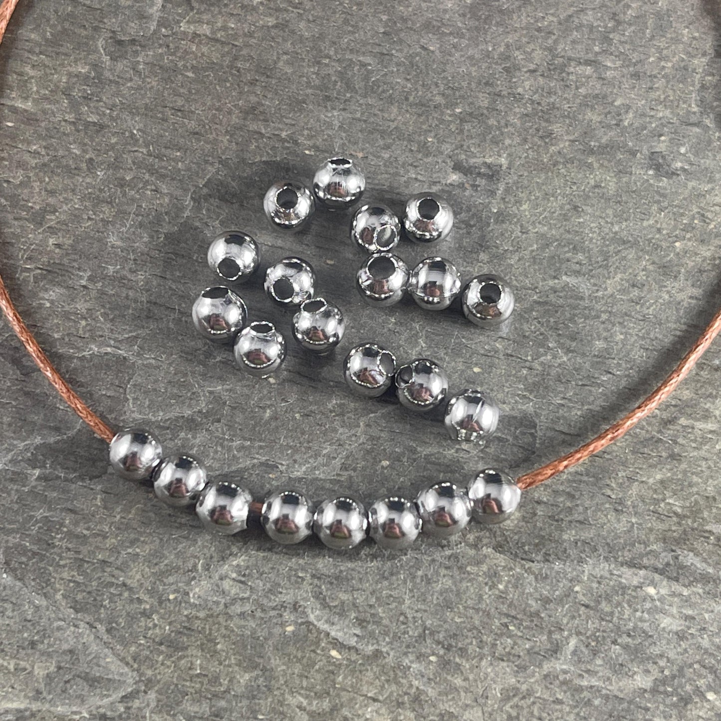 4mm Stainless Steel Round Beads - 1.6mm hole - Hollow, Lightweight (I050-4mm) * Qty. 75