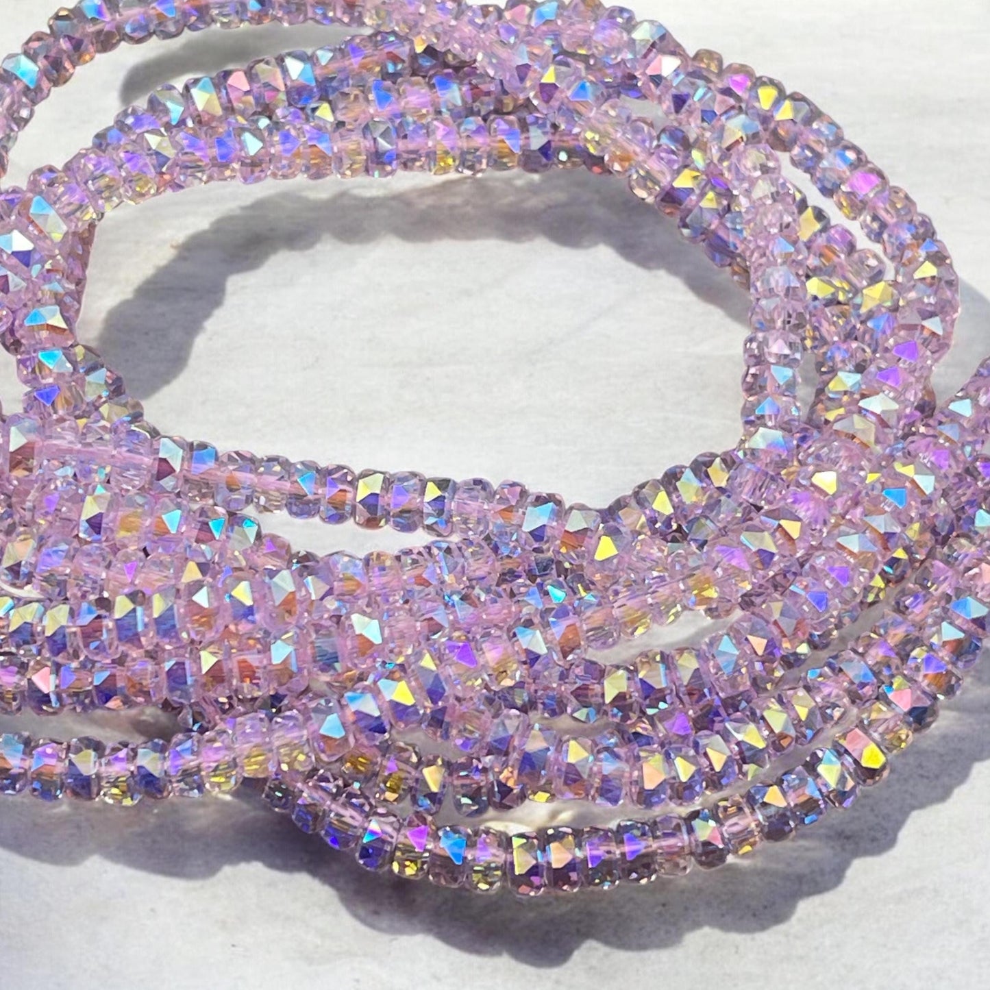 Faceted Glass Beads - 4x2.5mm Heishi Rondelles, Transparent Light Pink with AB Finish (LtPink-AB) * 7" Strand