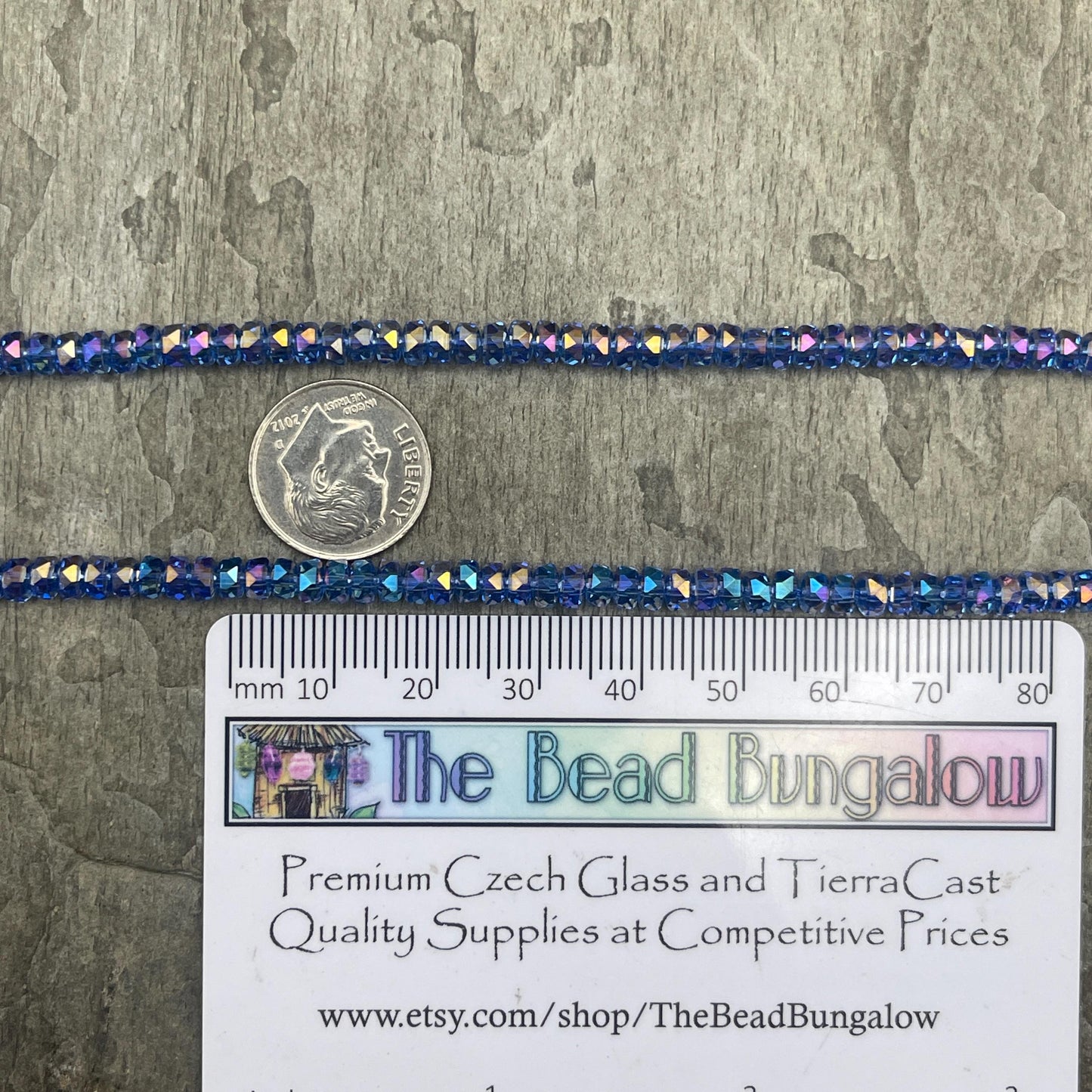 Faceted Glass Beads - 4x2.5mm Heishi Rondelles, Transparent Light Sapphire Blue with AB Finish (LtSapphire-AB) * 7" Strand