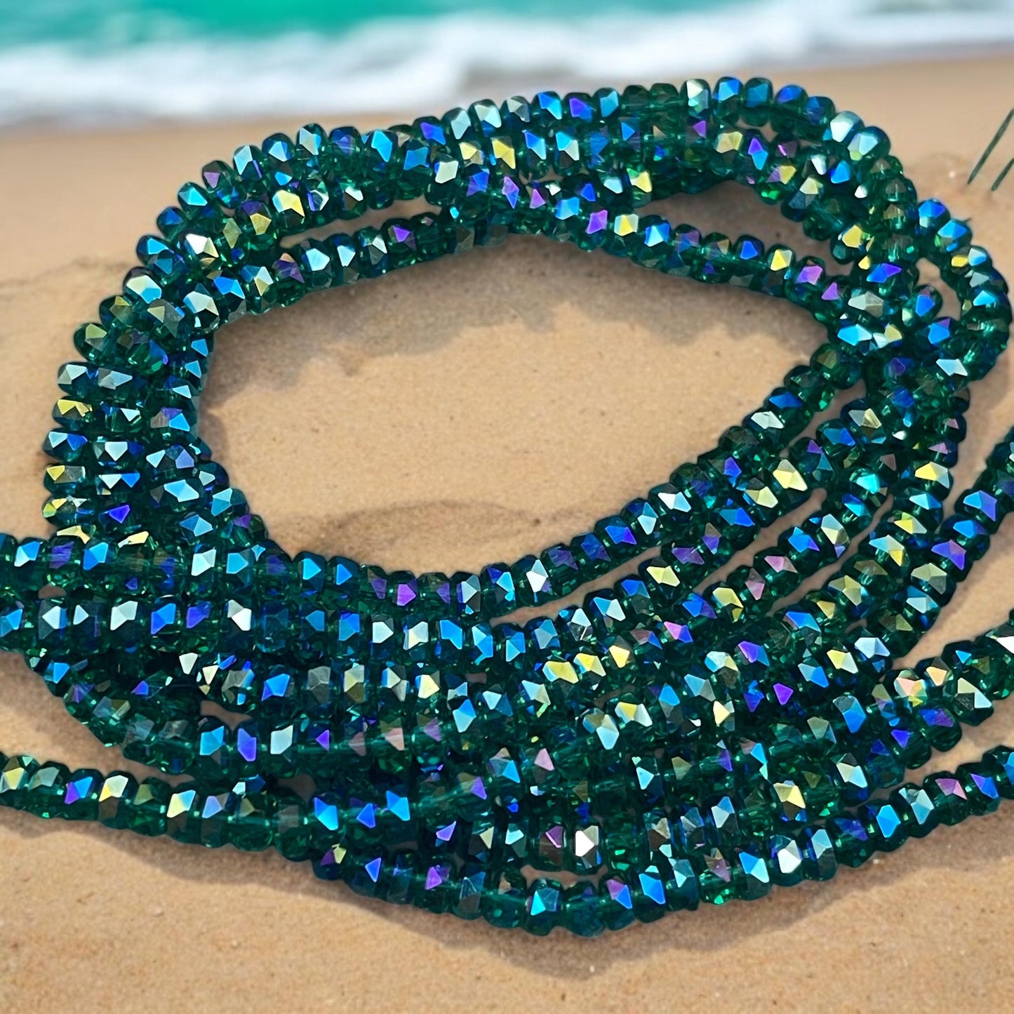 Faceted Glass Beads - 4x2.5mm Heishi Rondelles, Transparent Emerald with Rainbow Iris AB (EmeraldIris) * 7" Strand