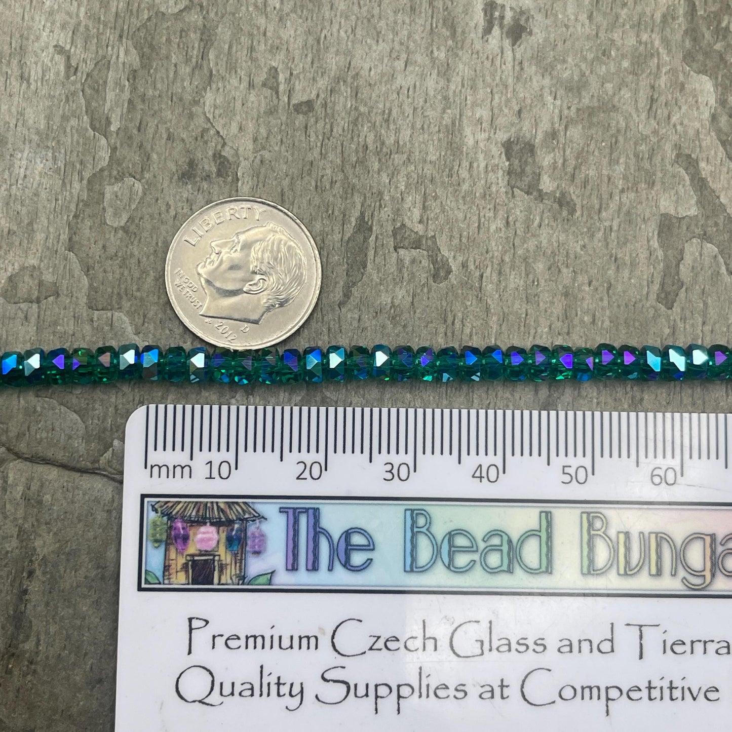Faceted Glass Beads - 4x2.5mm Heishi Rondelles, Transparent Emerald with Rainbow Iris AB (EmeraldIris) * 7" Strand