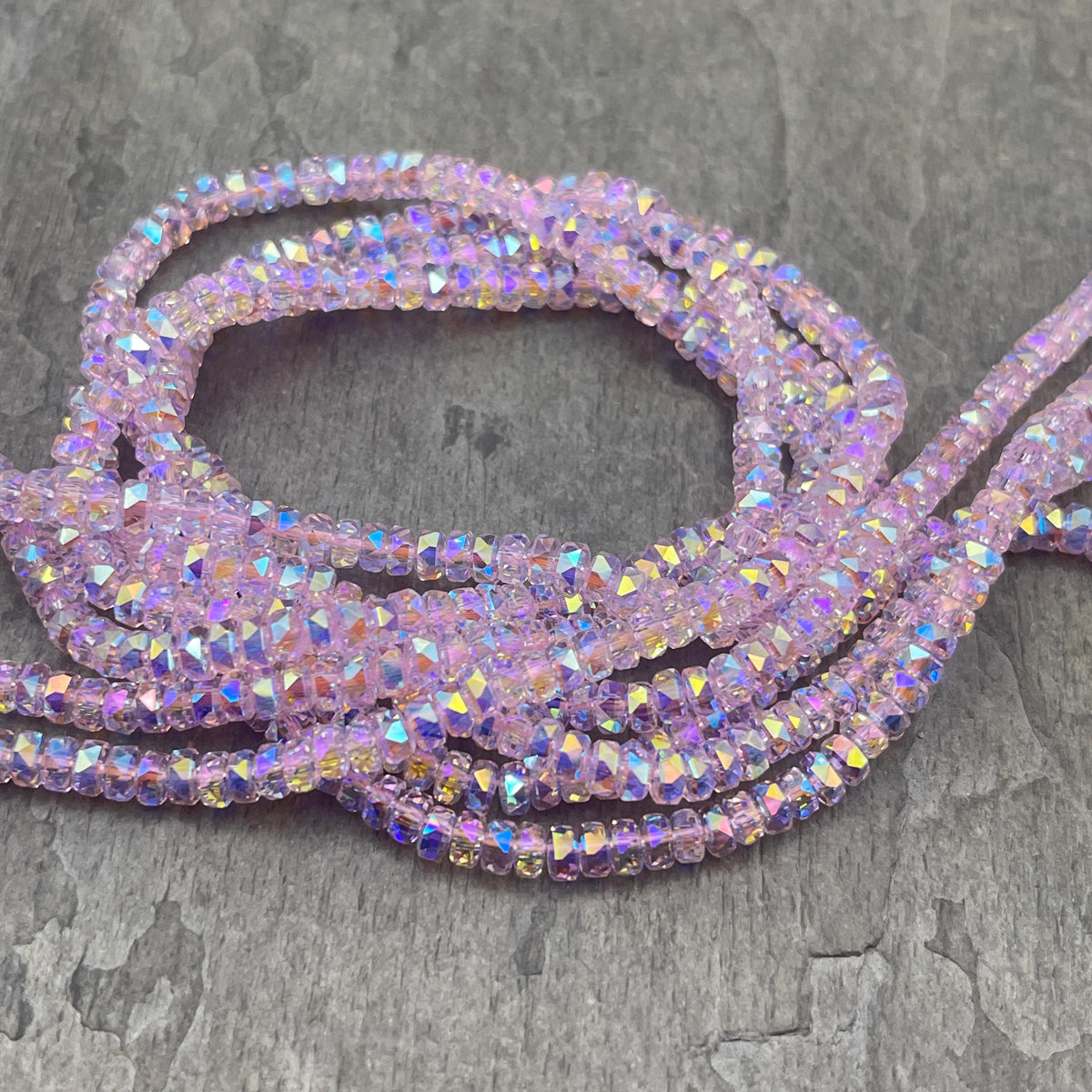 Faceted Glass Beads - 4x2.5mm Heishi Rondelles, Transparent Light Pink with AB Finish (LtPink-AB) * 7" Strand