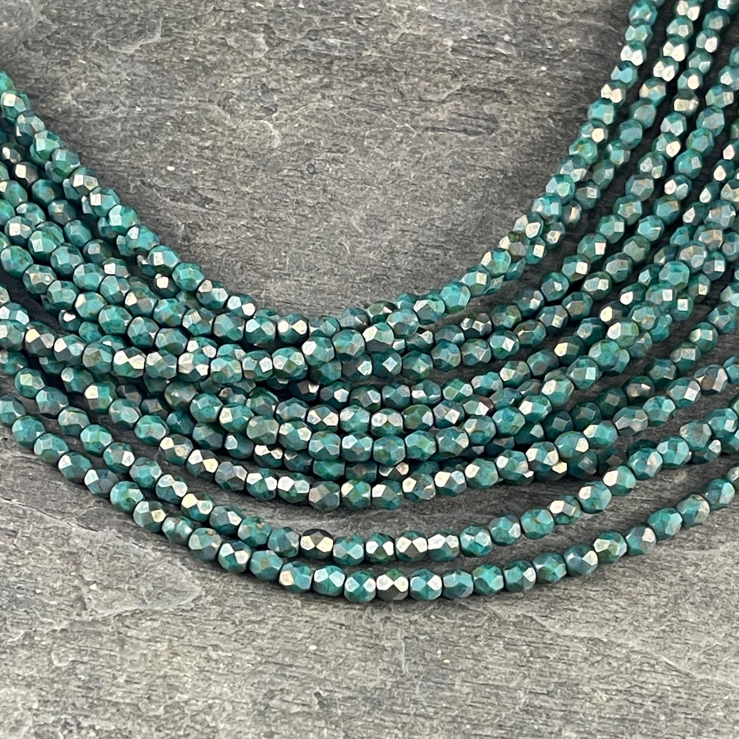 Czech Beads - 4mm Faceted Round Turquoise with Copper Picasso (FP4/SM-CT6315) * Qty. 50