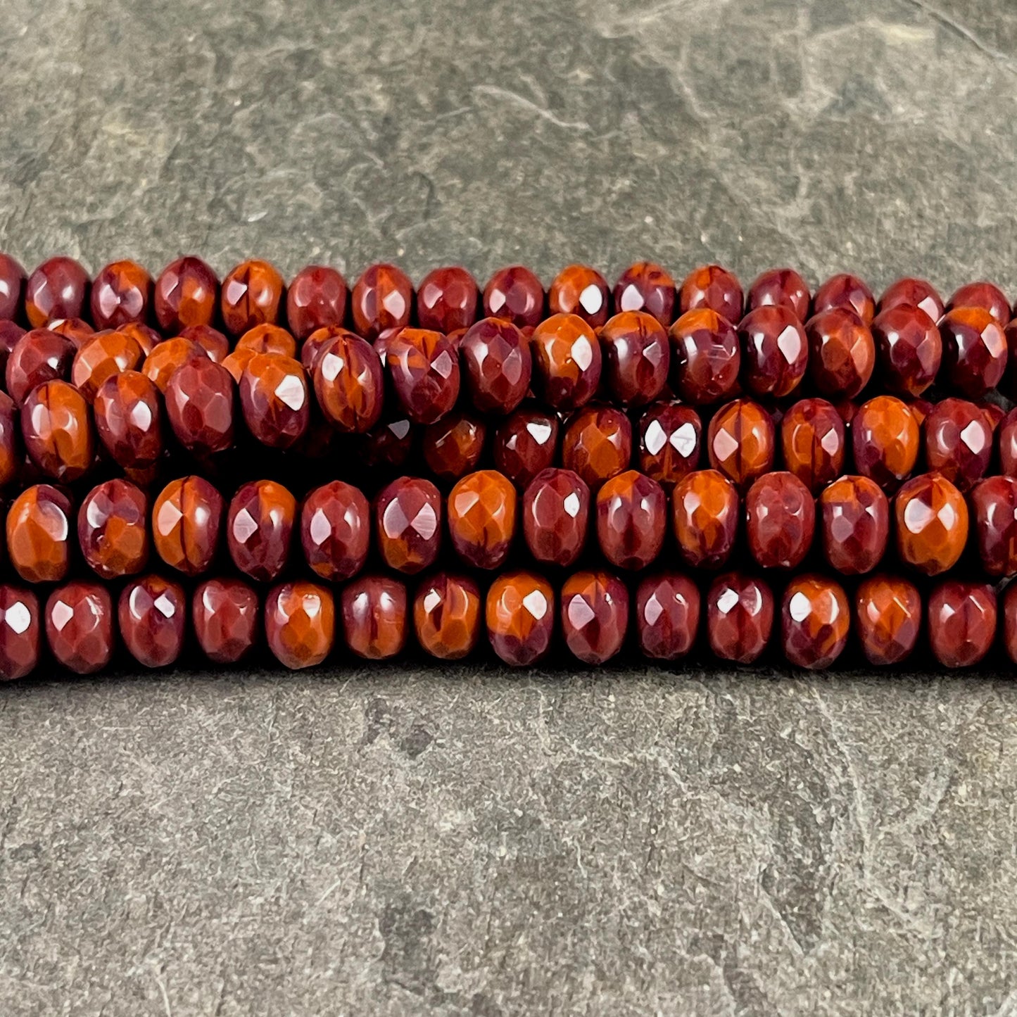 Czech Glass Beads - 7x5mm Faceted Rondelles, Brick Red and Burnt Orange (R7/OB-xRO) * Qty. 21