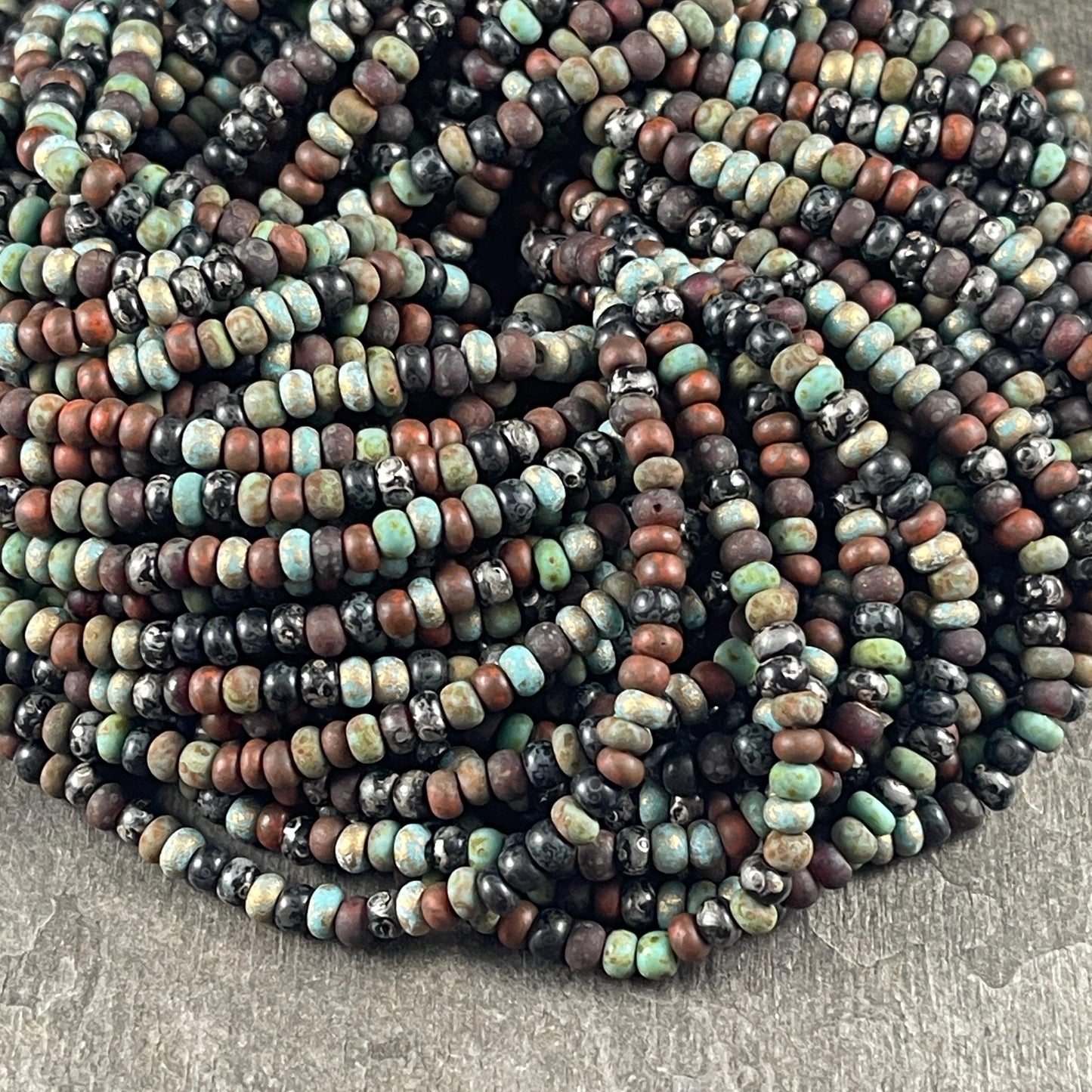 Aged Picasso Beads - 4mm Czech Glass Turquoise and Black Metallic Turquoise Mix (6/0-JeweledMATTE) * 20" strand