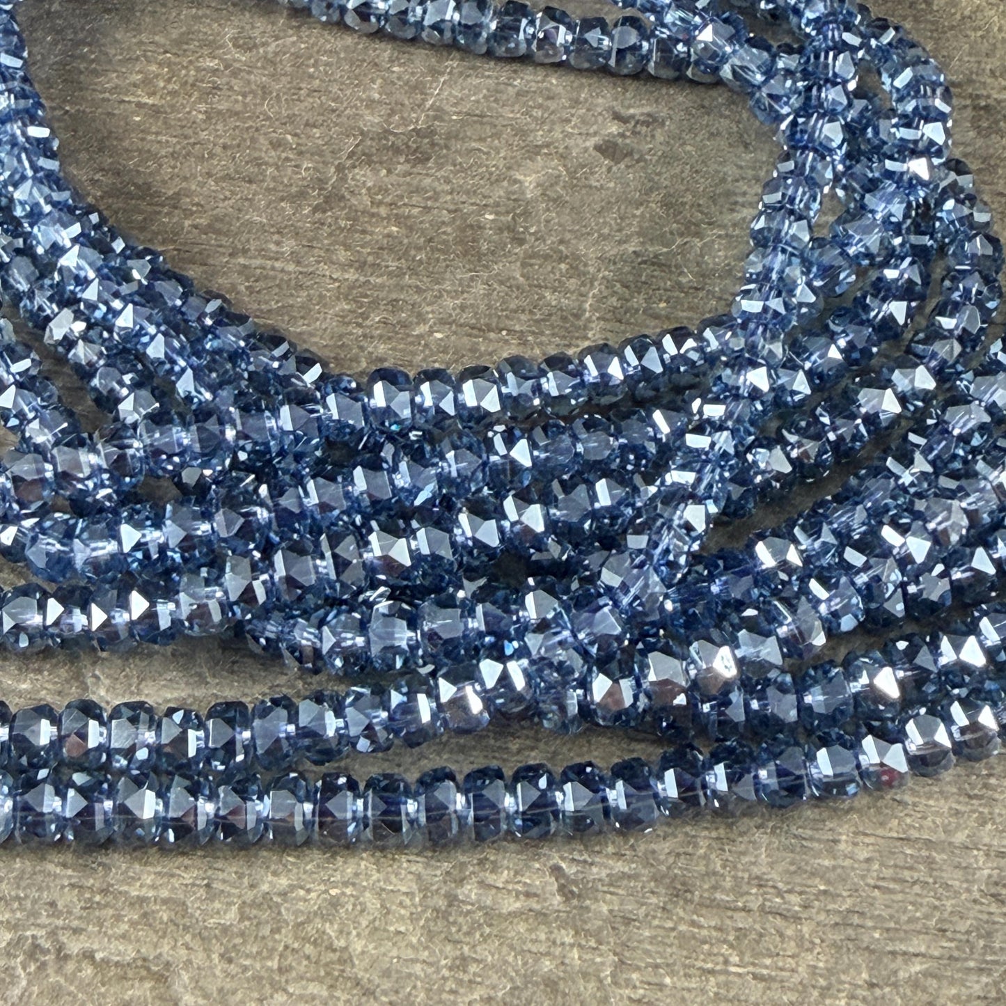 Faceted Glass Beads - 4x2.5mm Heishi Rondelles, Transparent Sapphire Blue (Sapphire) * 7" Strand