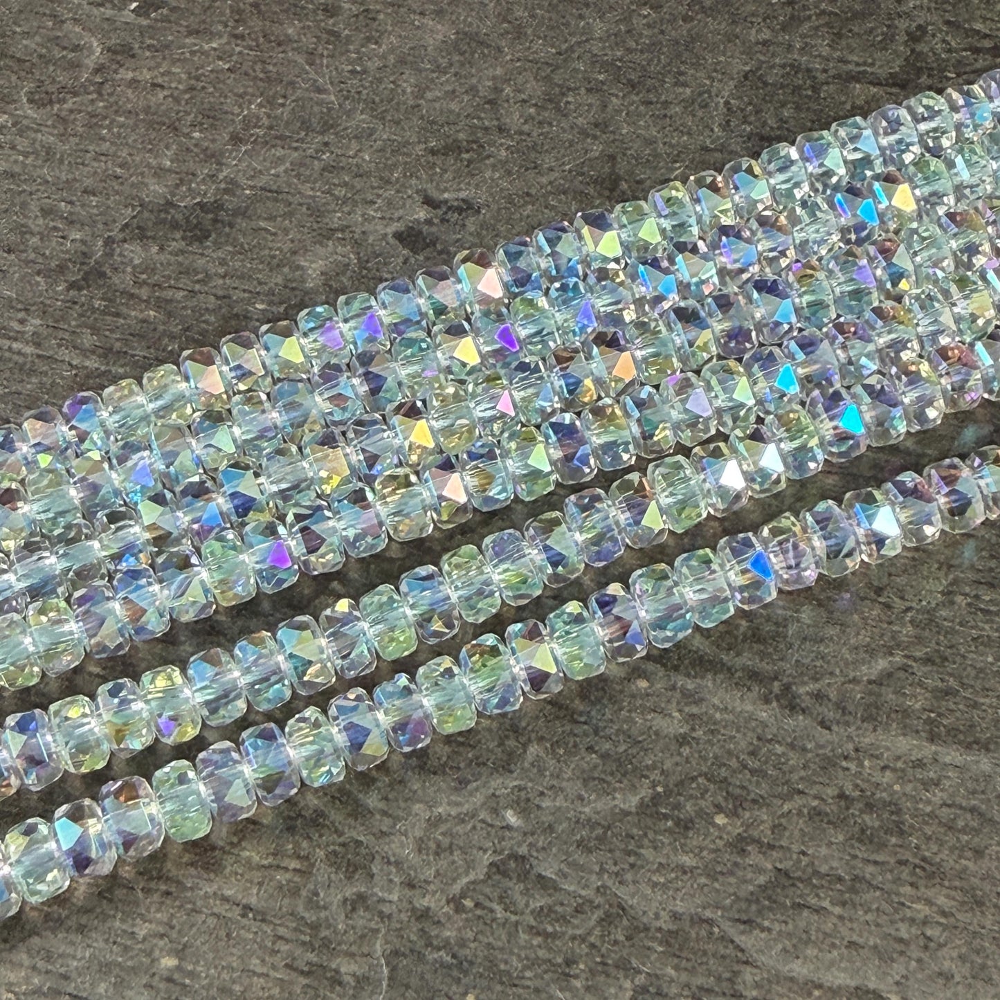 Faceted Glass Beads - 4x2.5mm Heishi Rondelles, Clear with AB Finish (Clear AB) * 7" Strand