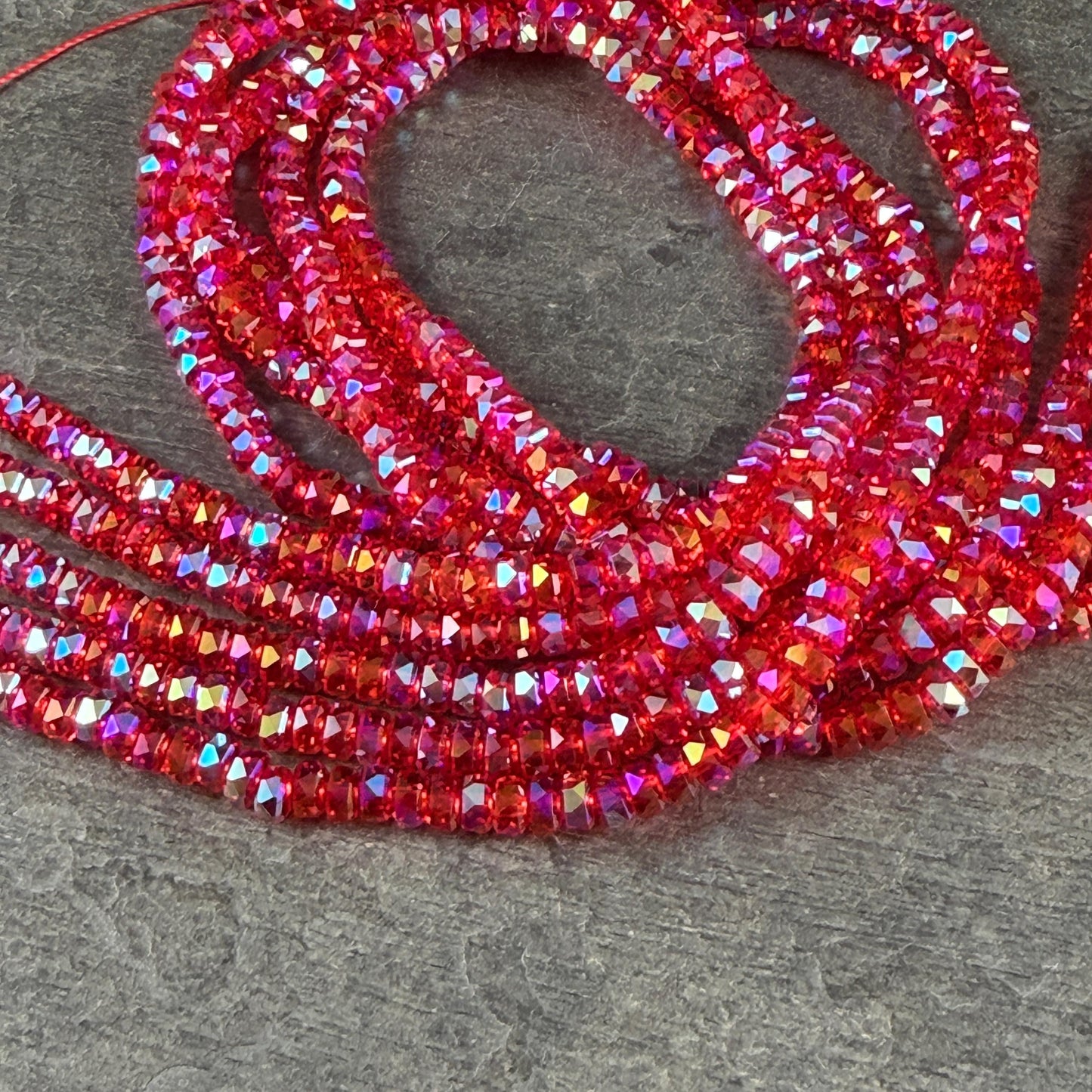 Faceted Glass Beads - 4x2.5mm Heishi Rondelles, Siam AB Transparent Red (Siam-AB) * 7" Strand