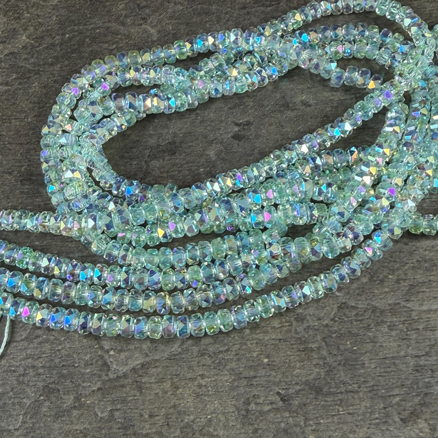 Faceted Glass Beads - 4x2.5mm Heishi Rondelles, Very Light Green with AB Finish (LtGreenAB) * 7" Strand