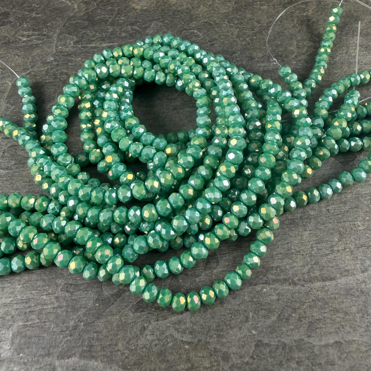 4.5x3.5mm Faceted Glass Beads, Opaque Spring Green with AB Finish (SprGreenAB-4) * 12" Strand
