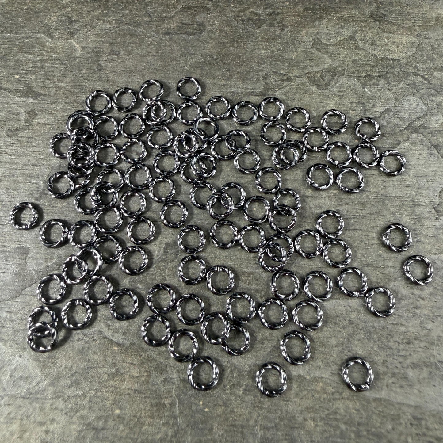 6mm Twisted Jump Rings, 16g Open, Gunmetal Black Plated Brass (FMG/5046) * Qty. 100