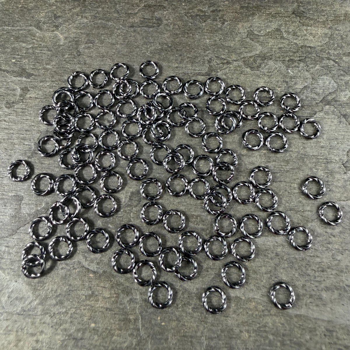6mm Twisted Jump Rings, 16g Open, Gunmetal Black Plated Brass (FMG/5046) * Qty. 100