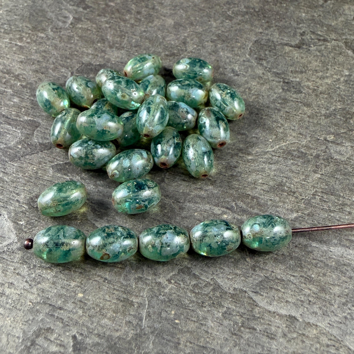 Czech Glass Beads - 9x6mm Olive Oval, Aqua Blue Picasso (R964855) * 25 Beads