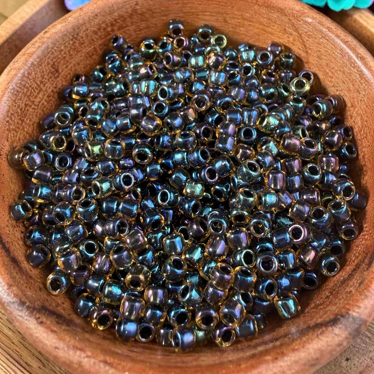 8/0 TOHO Glass Seed Beads, Rainbow Light Topaz, Black Lined (T8/SM-244) * 20 grams