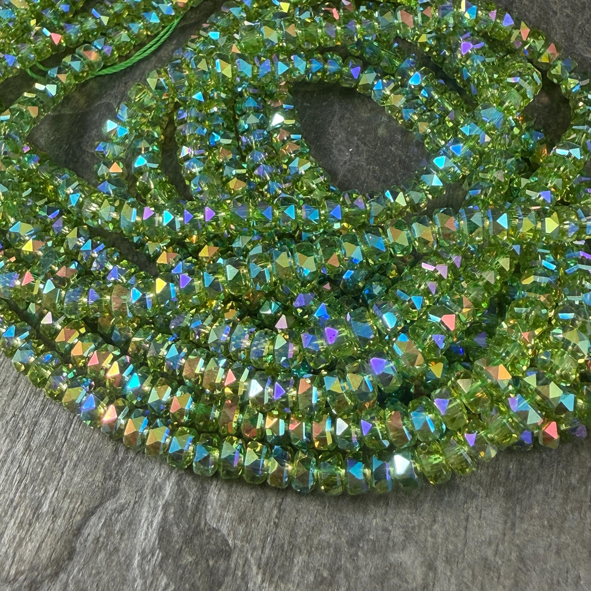 Faceted Glass Beads - 4x2.5mm Heishi Rondelles, Transparent Lime Green with Rainbow AB Finish (Lime-AB) * 7" Strand