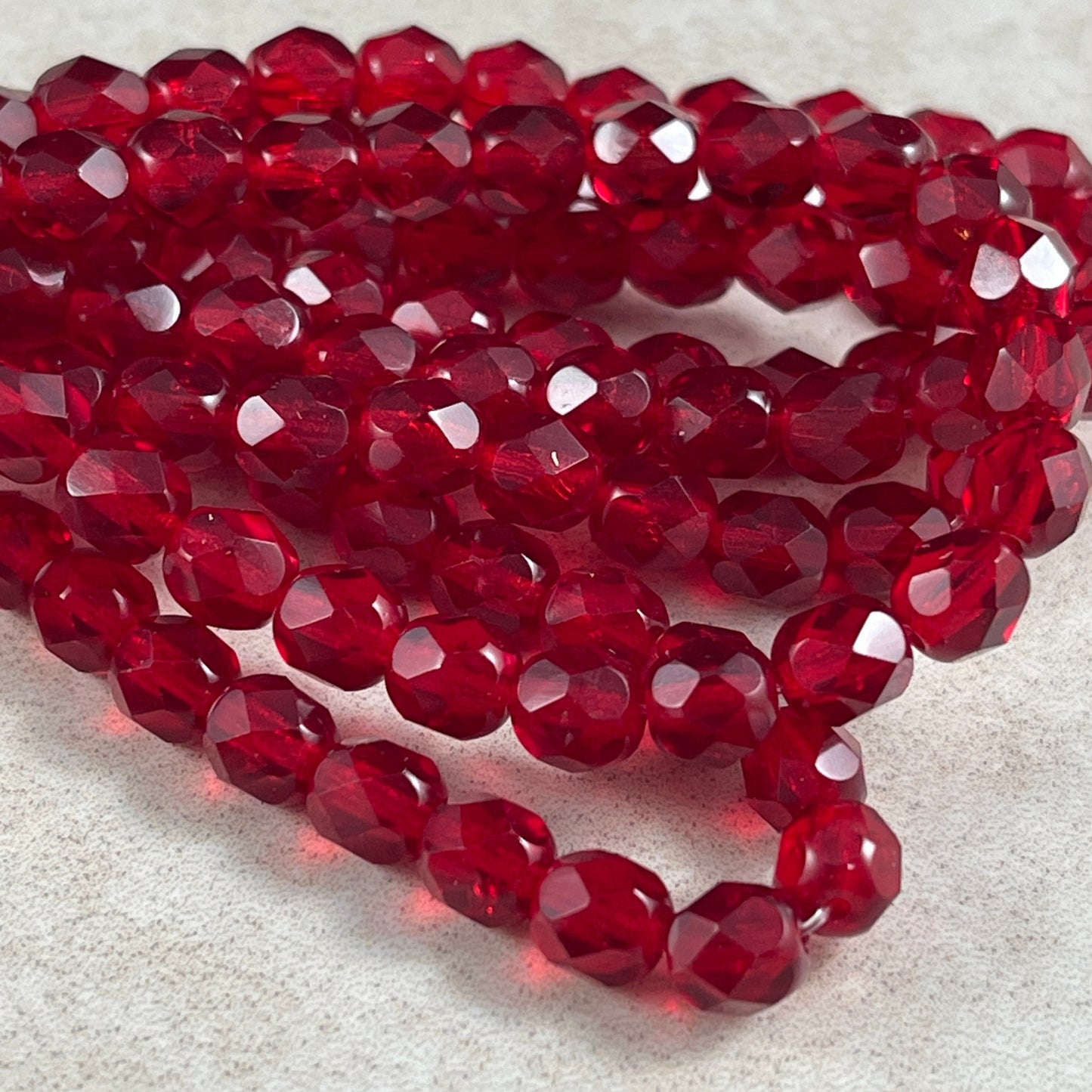 Czech Glass Beads - 6mm Faceted Round Beads, Transparent Ruby Red (FP6/N-138) * Qty. 25