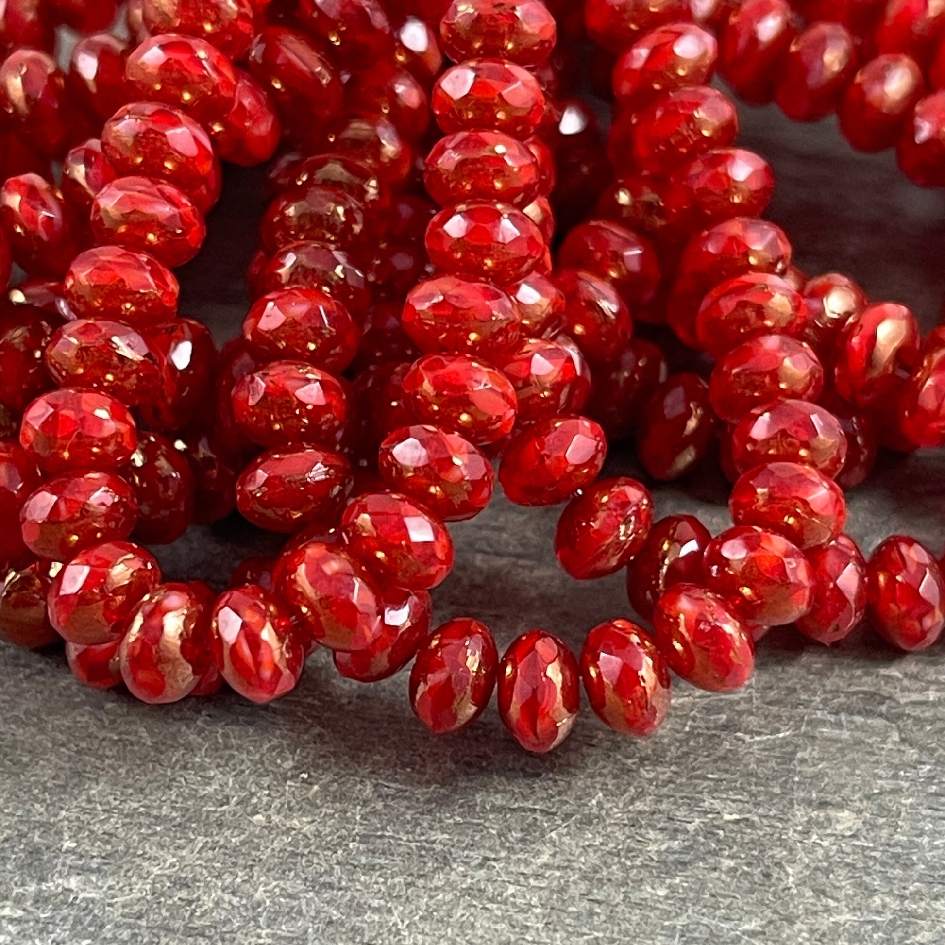 Red and Bronze Faceted Czech Glass Beads, 5x3mm Rondelle, Transparent Ruby Red and Opaque Red with Bronze Picasso (R5/N-0186) - Qty. 30