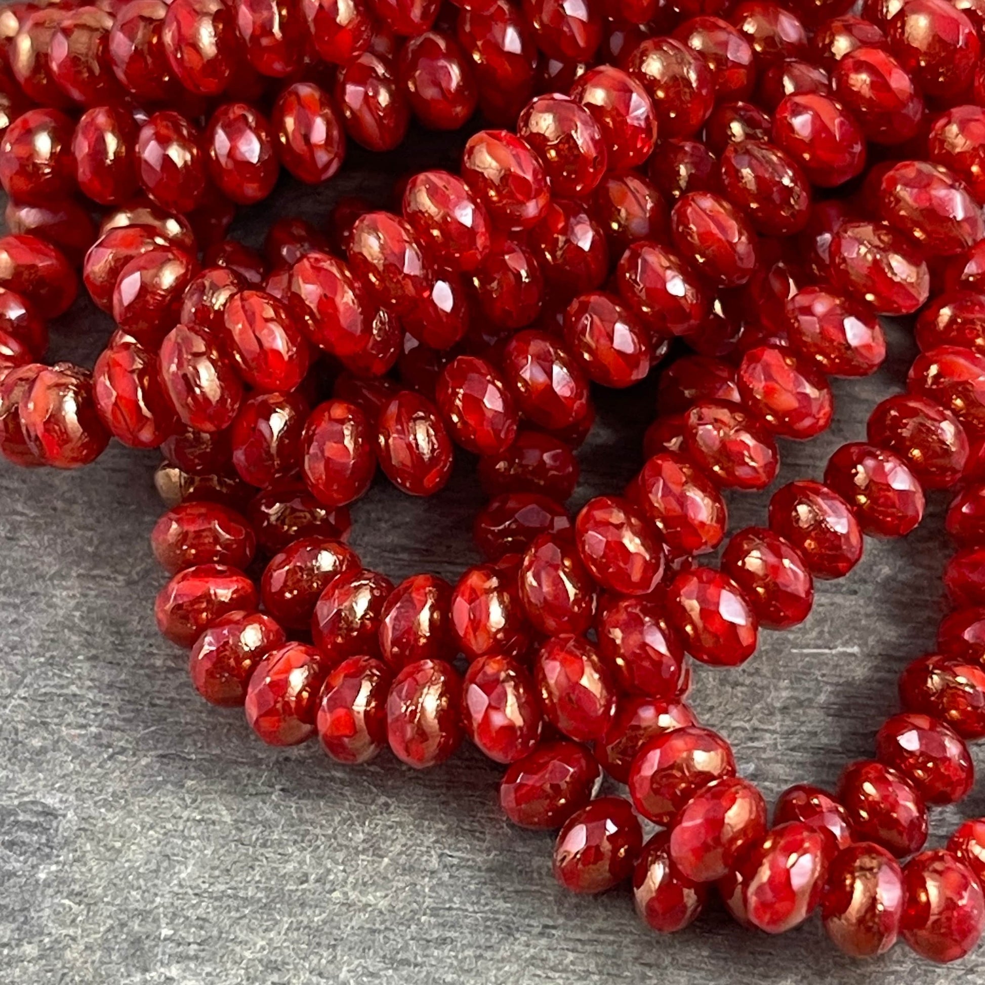 Red and Bronze Faceted Czech Glass Beads, 5x3mm Rondelle, Transparent Ruby Red and Opaque Red with Bronze Picasso (R5/N-0186) - Qty. 30