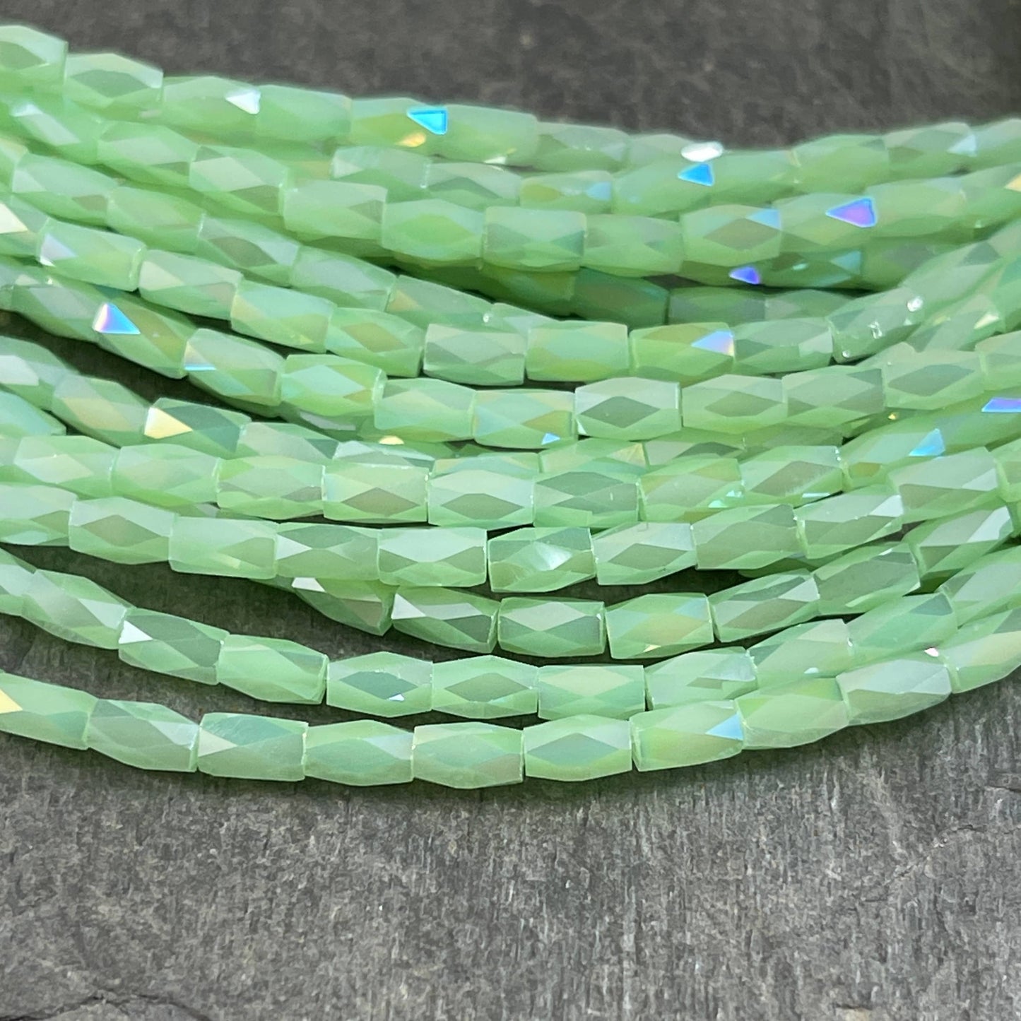 Small Faceted Glass Beads 5mm Faceted Tube Beads Pale Green AB Luster 5x3mm Tube Beads Light Green Luster Beads (FGT-LGAB) - 18" Strand