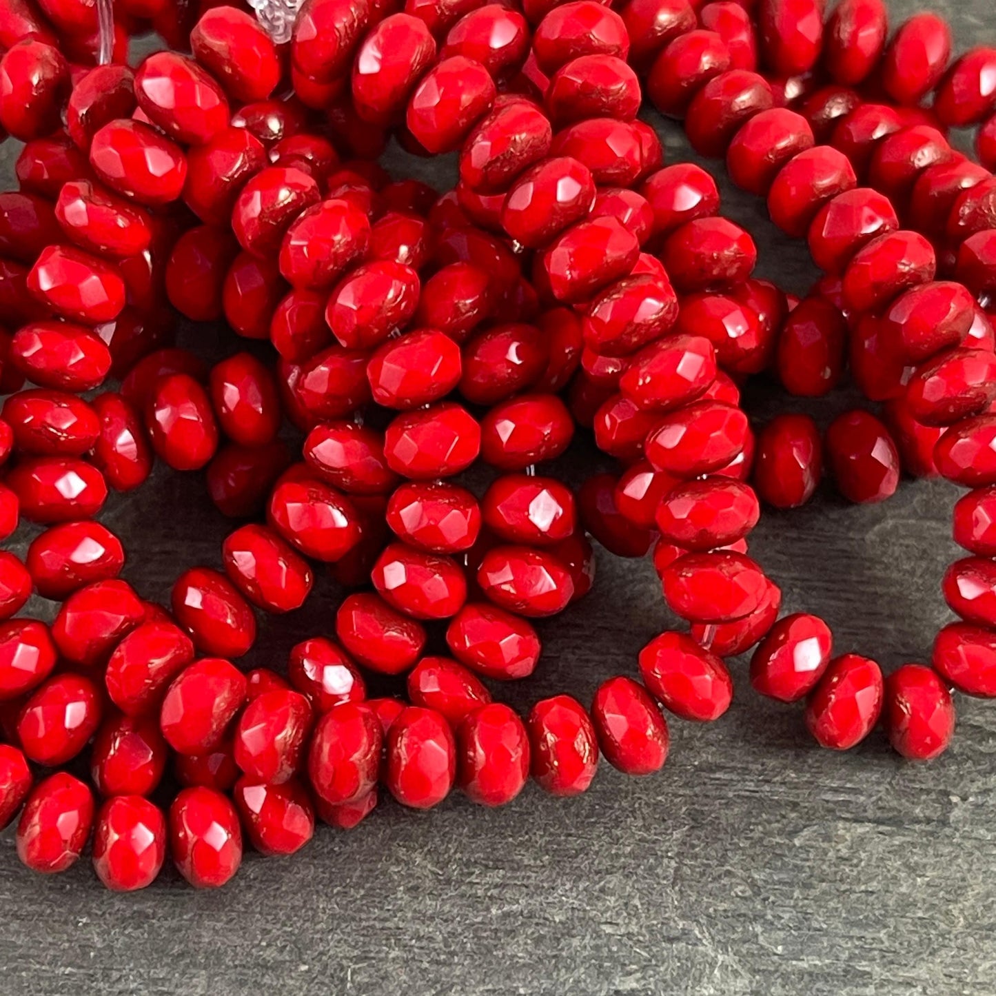 Czech Glass Beads - 5x3mm Faceted Rondelle, Opaque Bright Red Glass with Bronze Picasso (R5/N-0147) * Qty. 30