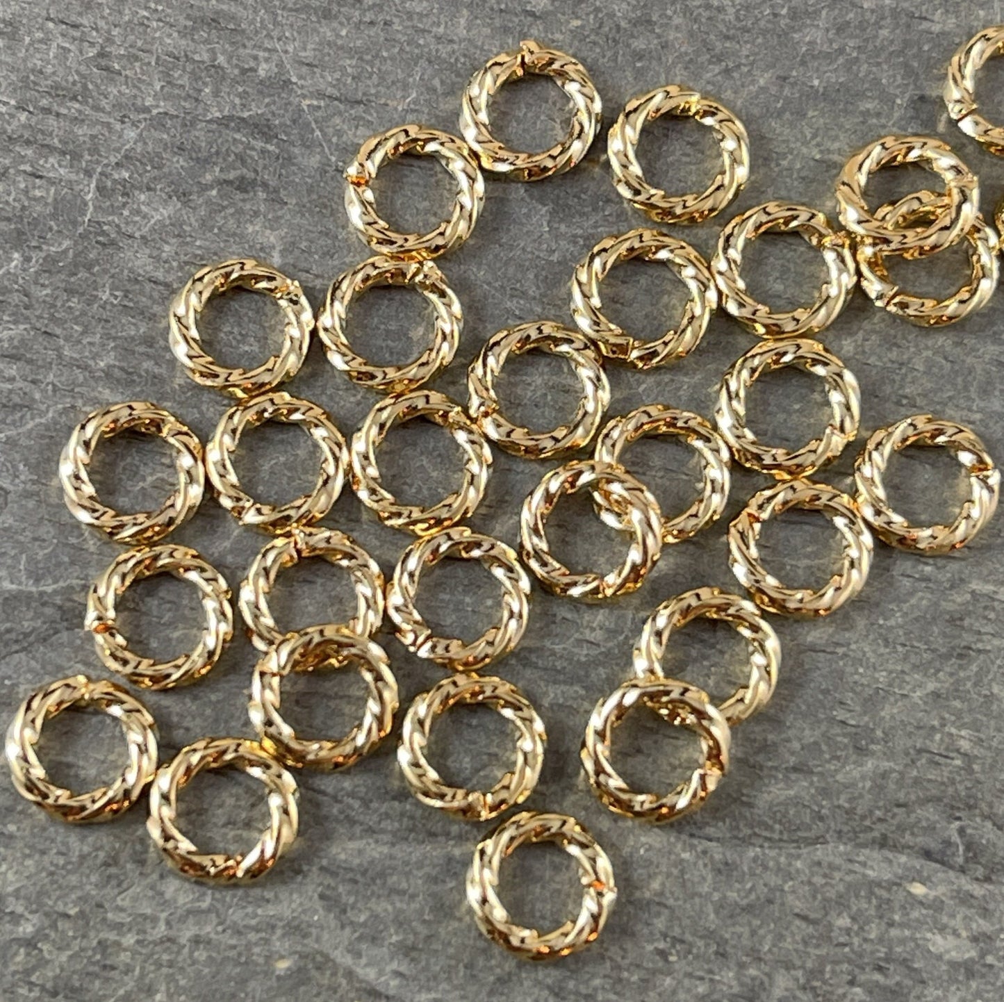 6mm Twisted Jump Rings, 16g Open, Gold Plated Brass (FMG/5038) * Qty. 100