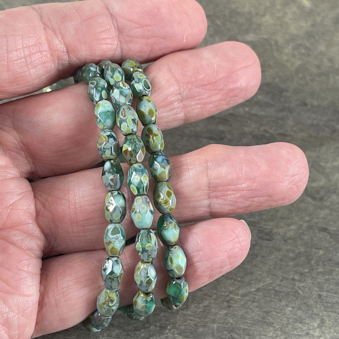 Czech Glass - 7x5mm Faceted Oval, Turquoise, Capri Blue and Emerald Green with Picasso Finish (FOV/N-0601) * Qty. 20