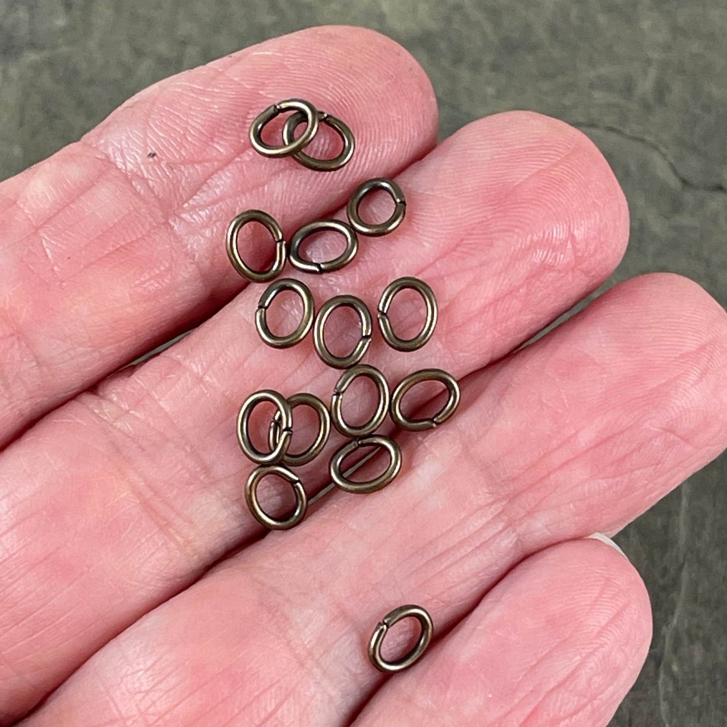 6x4mm Oval Jump Rings, 18g Open, Antiqued Brass Plated (FMG/5054) * Qty. 100