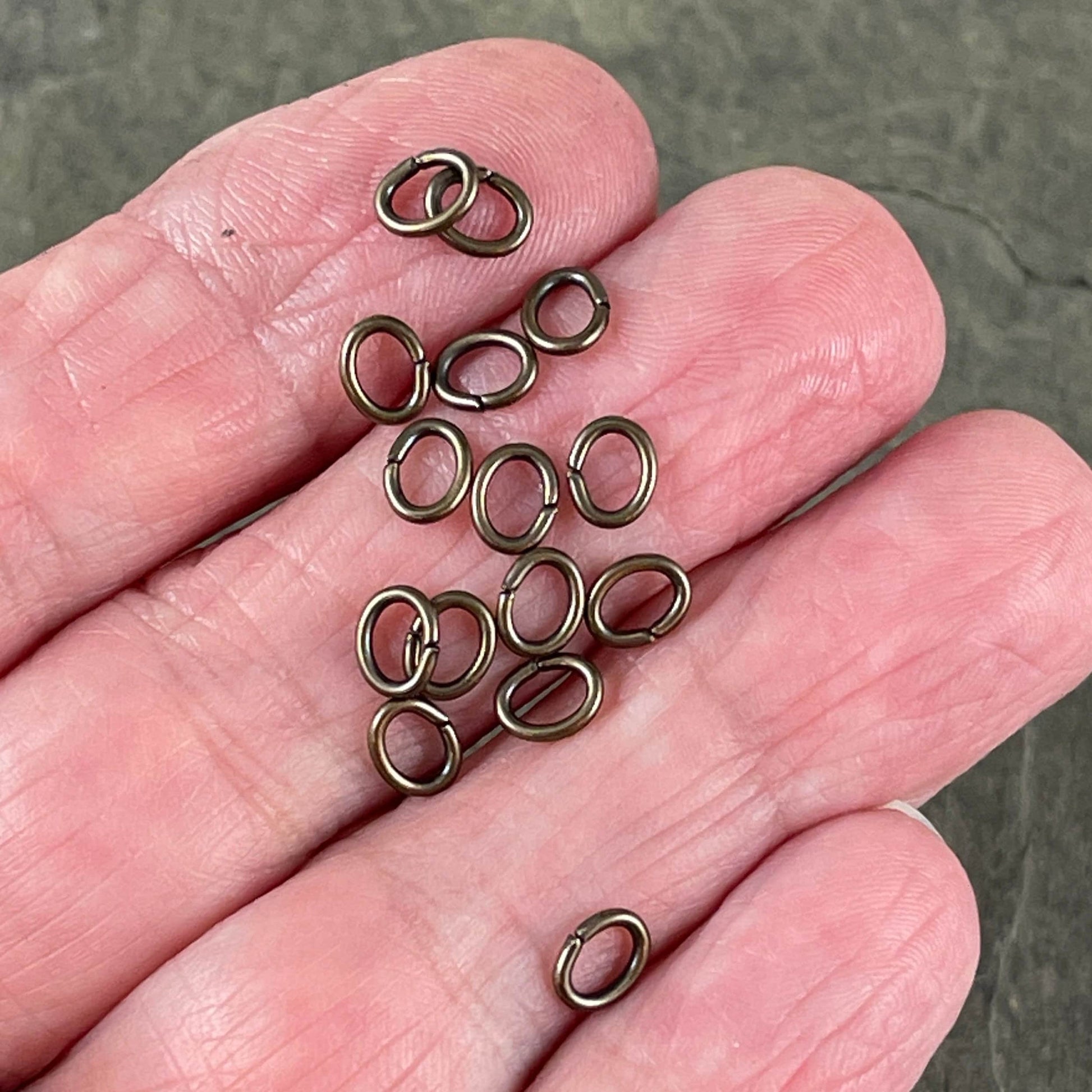 6x4mm Oval Jump Rings, 18g Open, Antiqued Brass Plated (FMG/5054) * Qty. 100