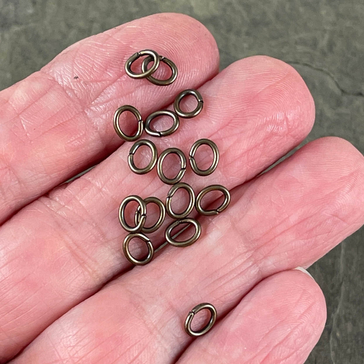 6x4mm Oval Jump Rings, 18g Open, Antiqued Brass Plated (FMG/5054) * Qty. 100