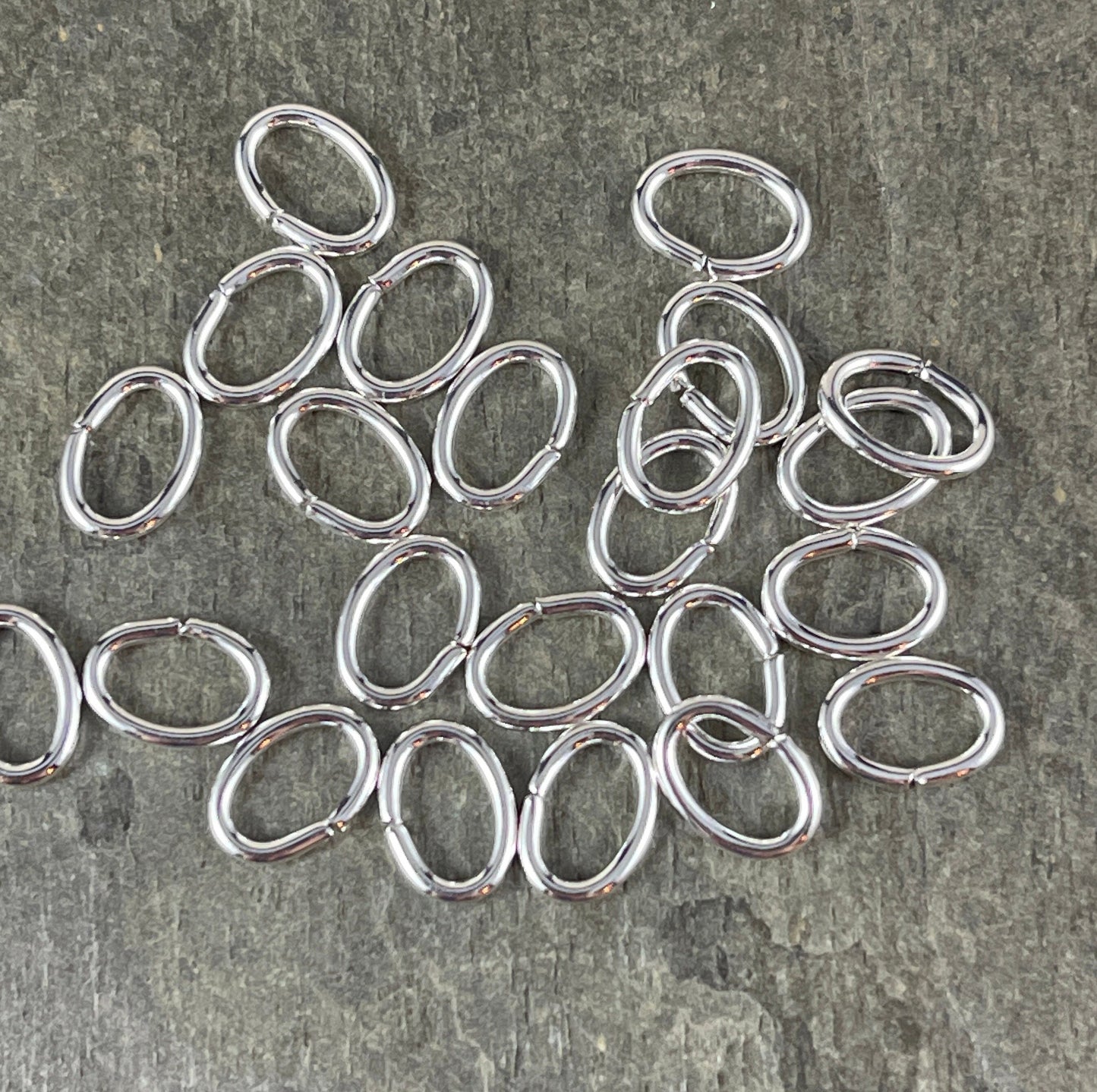 7x5mm Oval Jump Rings, 18g Open, Silver Plated Brass (FMG/5158) * Qty. 100