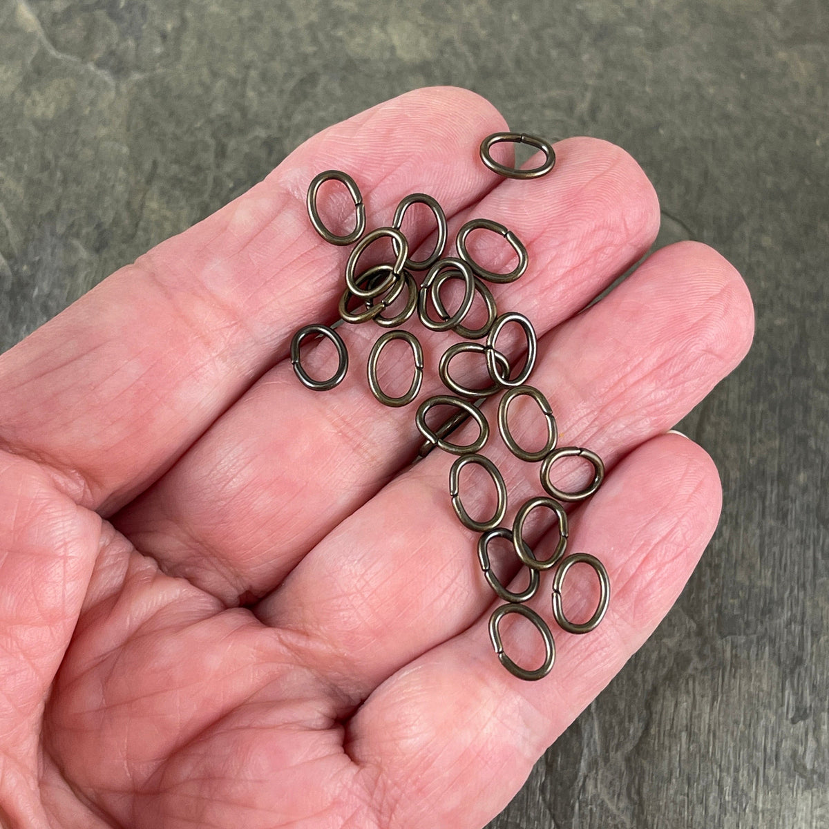 8x6mm Oval Jump Rings, 18g Open, Antiqued Brass Plated (FMG/5063) * Qty. 100