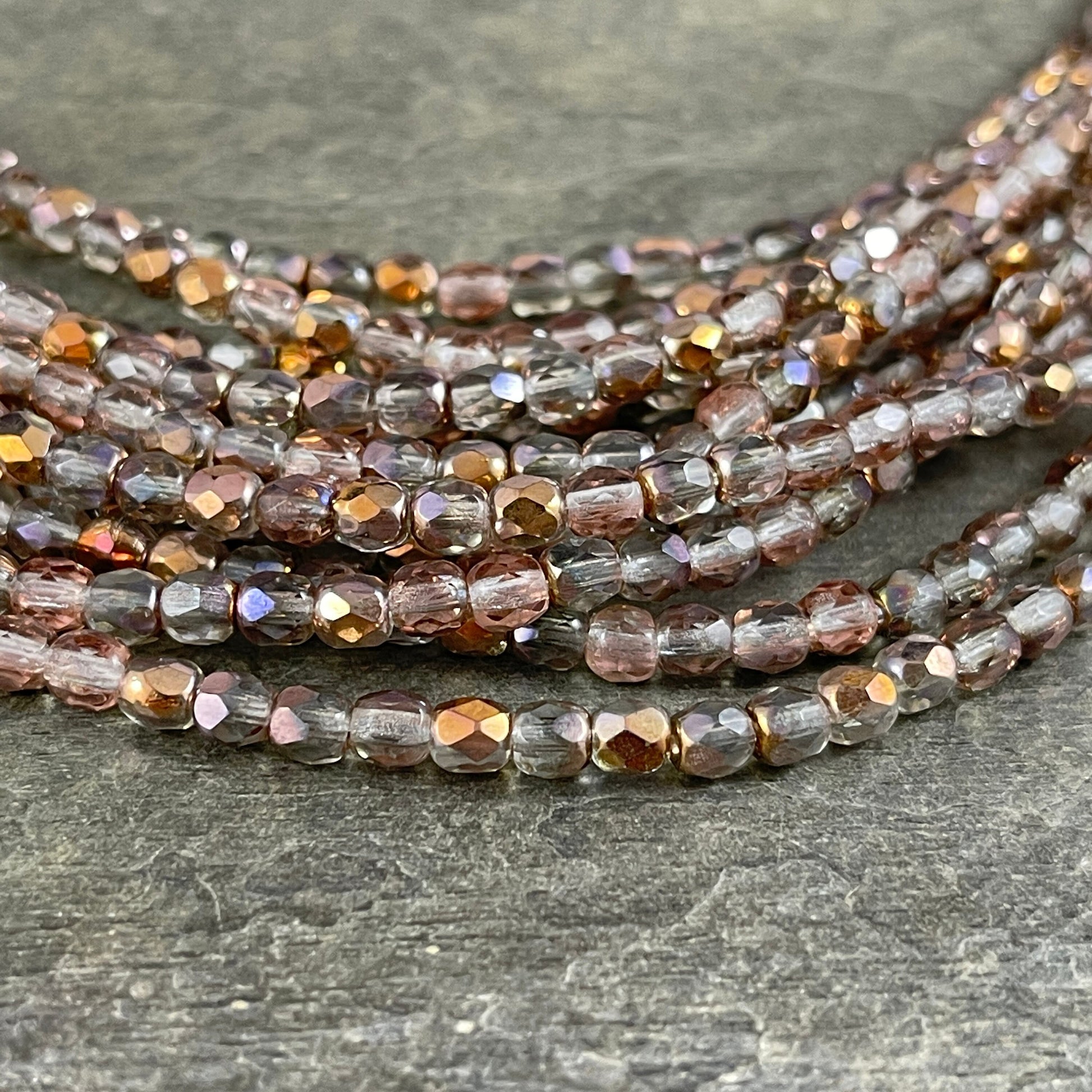 Crystal with Rose Gold Metallic Half Coat 4mm Faceted Round Beads - Clear and Rose Gold Beads (FP4/SM-27101) * Qty. 50