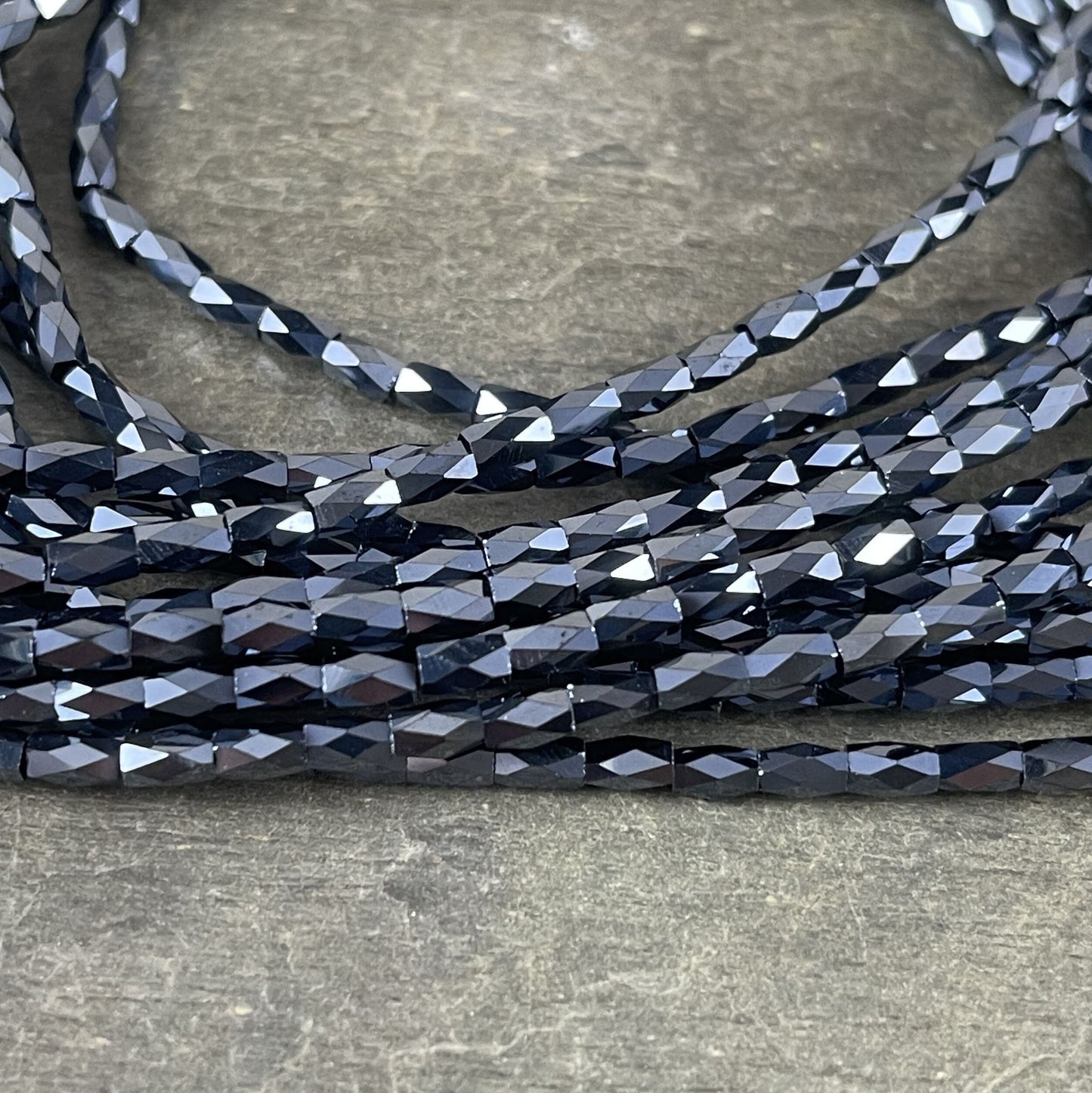 5mm Faceted Tube Beads, Opaque Black with High Shine Luster, 5x3mm Tube Beads (FGT-BlkL) * 17" Strand