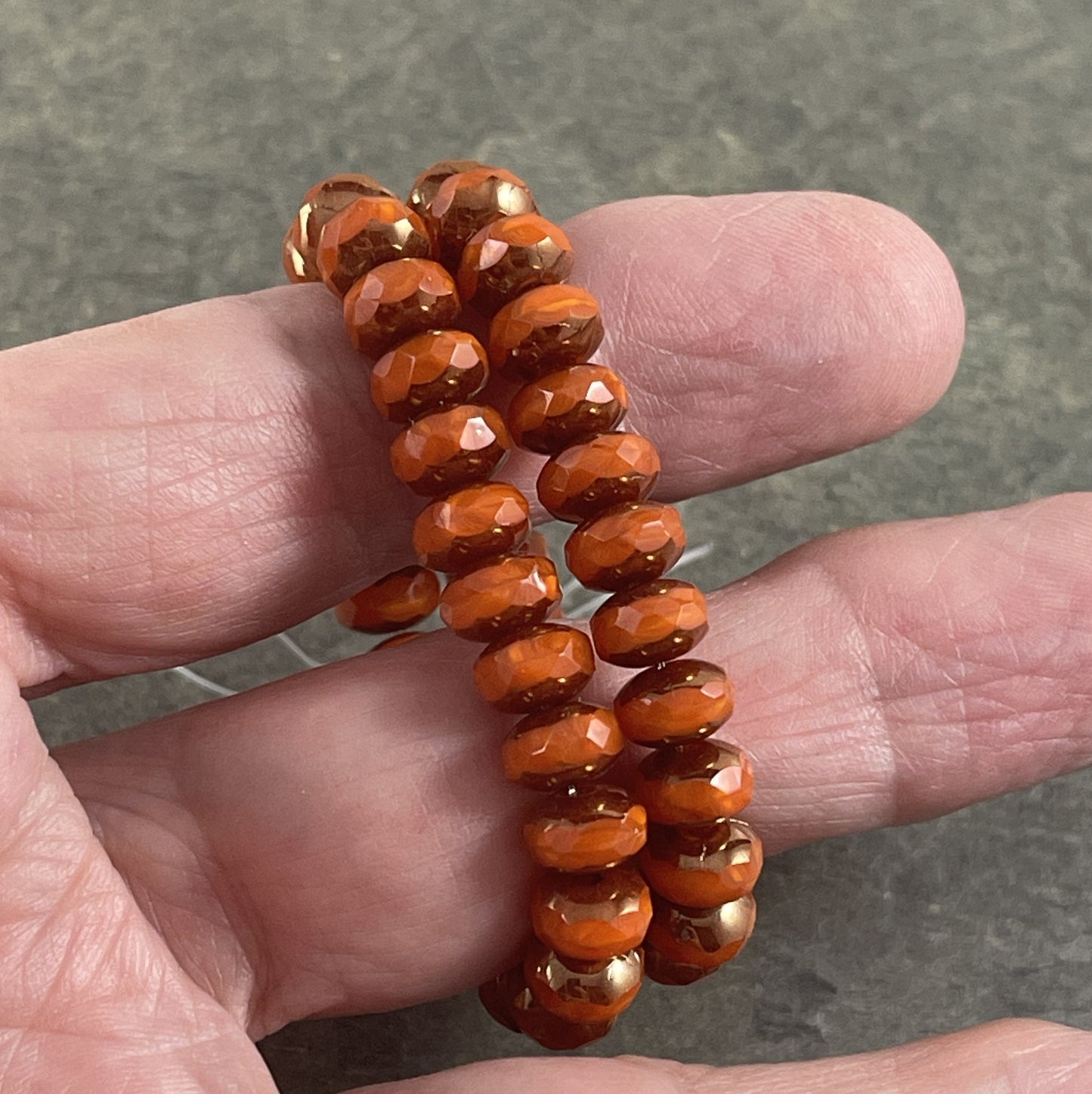 Czech Glass Beads - 5x7mm Opaque Orange Faceted Rondelle, Orange Opaline Glass with Bronze Picasso (R7/RJ-2758) * Qty. 25