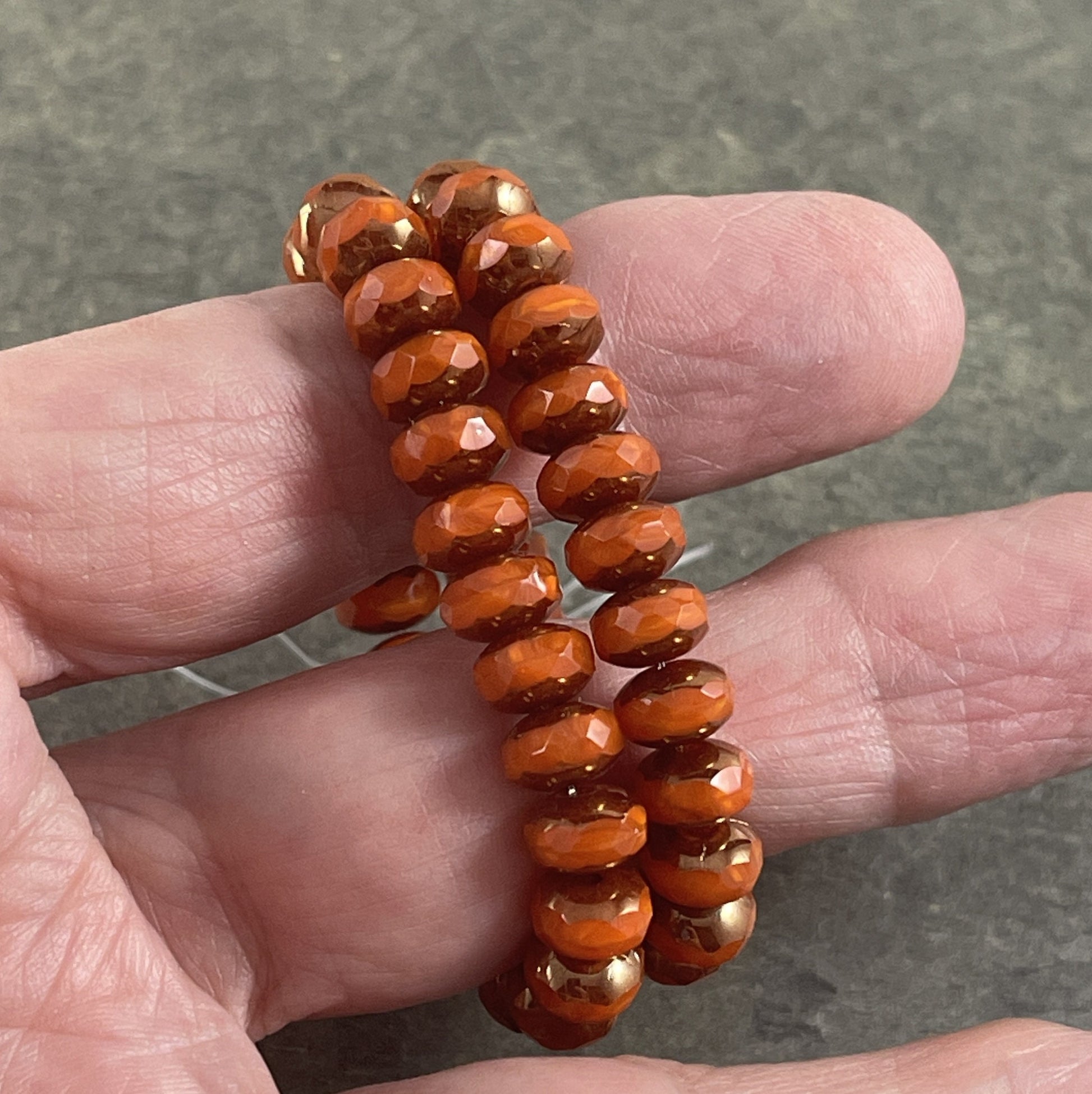 Czech Glass Beads - 5x7mm Opaque Orange Faceted Rondelle, Orange Opaline Glass with Bronze Picasso (R7/RJ-2758) * Qty. 25