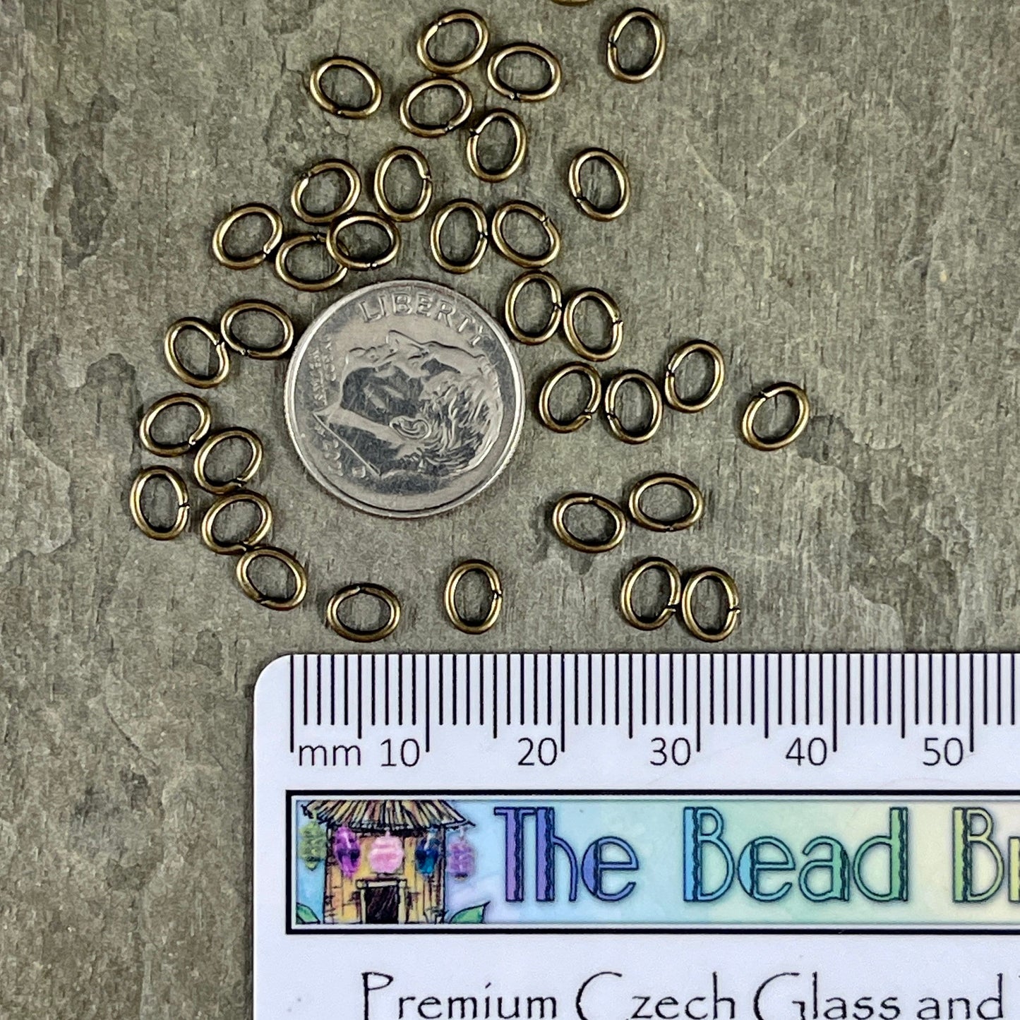 6x4mm Oval Jump Rings, 18g Open, Antiqued Brass Plated (FMG/5054) * Qty. 100
