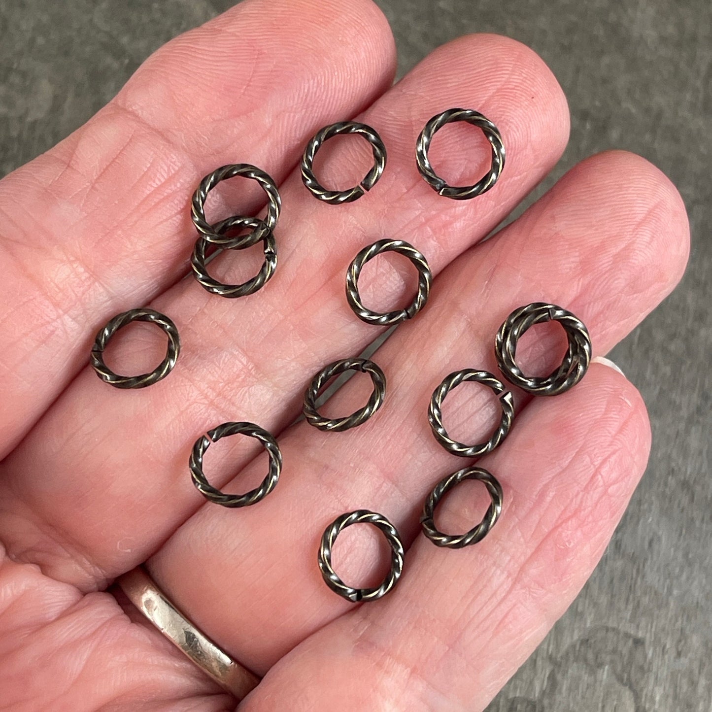 8mm Twisted Jumprings, 16g Open, Antiqued Brass (FMG/5032) * Qty. 100