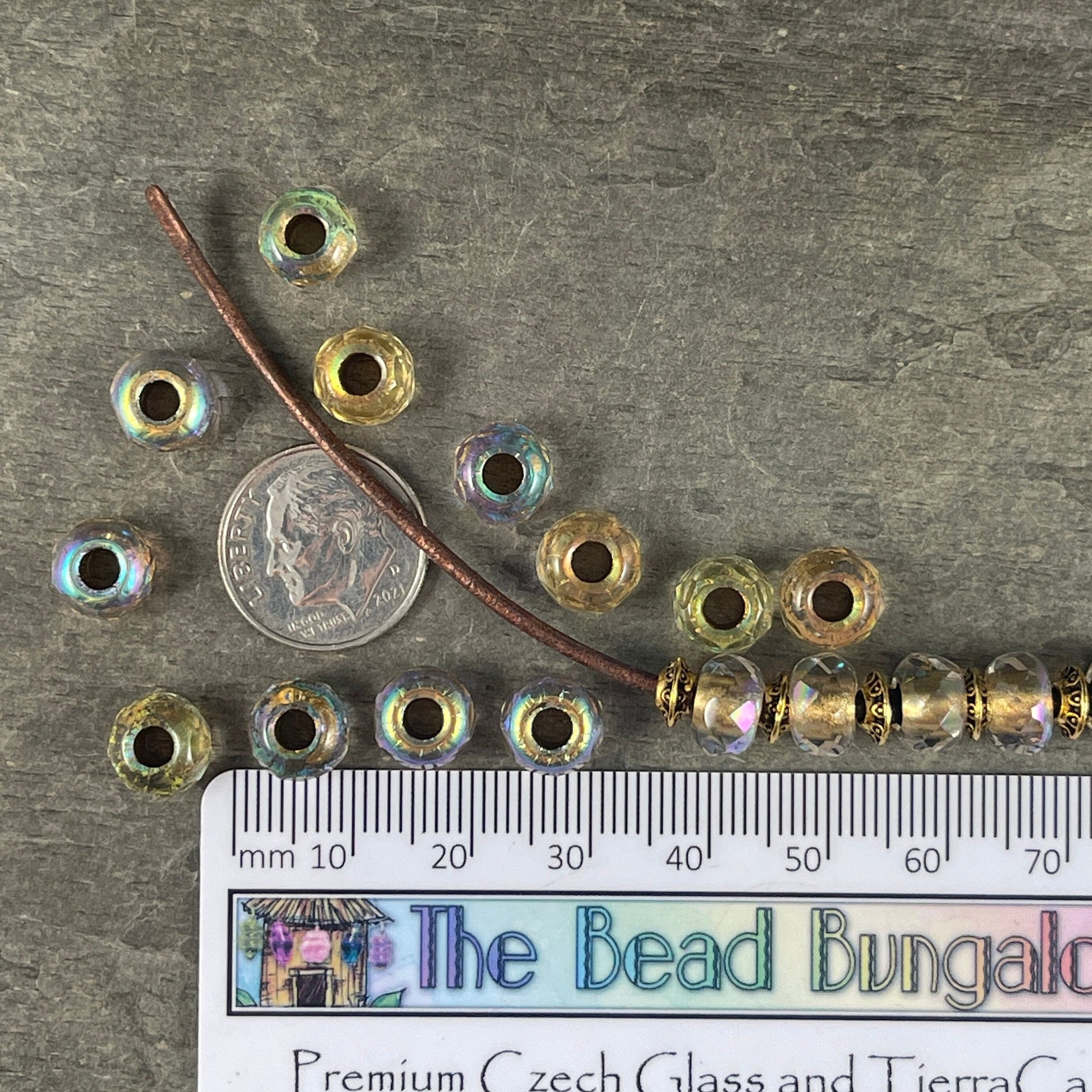 Czech Beads - 9x6mm Rondelle with 3.5mm hole, Transparent with Gold Core and AB Finish (ROL/N-1831) * 25 Beads